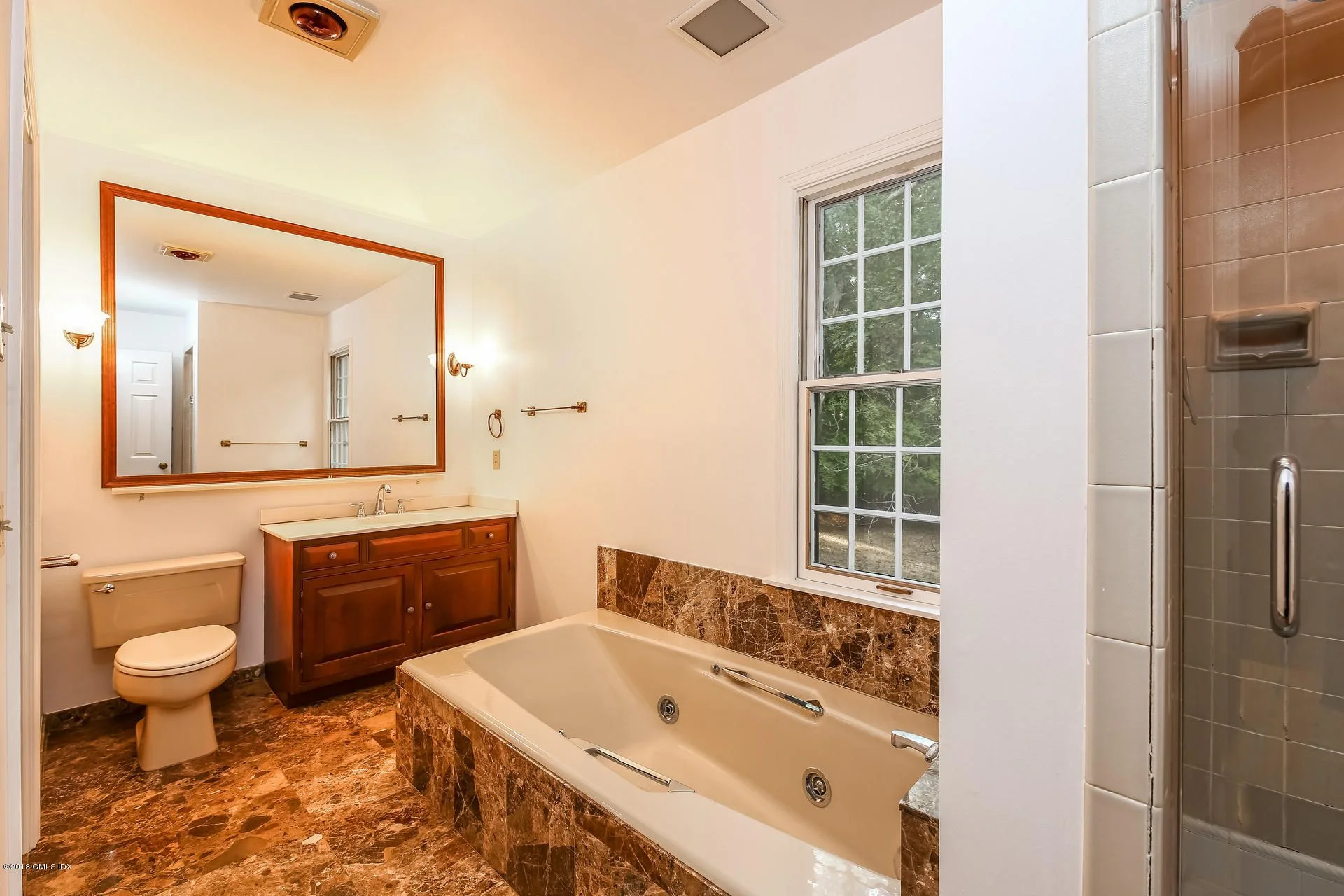 No a/c, certainly needs a new hvac system, including furnace, and this master bath is … unfortunate.