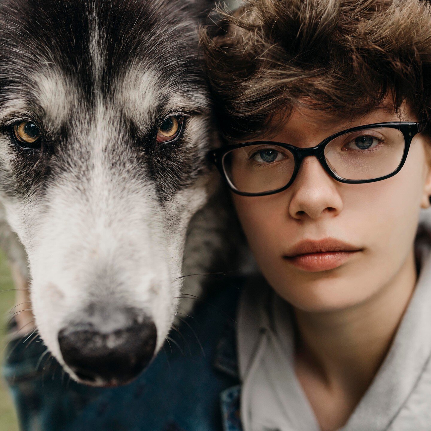 I never thought I could add &quot;Photoshoot with a wolf dog&quot; to my resume but here we are! 

Olivia is a 2023 graduate and, while booking her session, mentioned she'd be interested in including a wolf dog in her shoot if possible. Would you bel