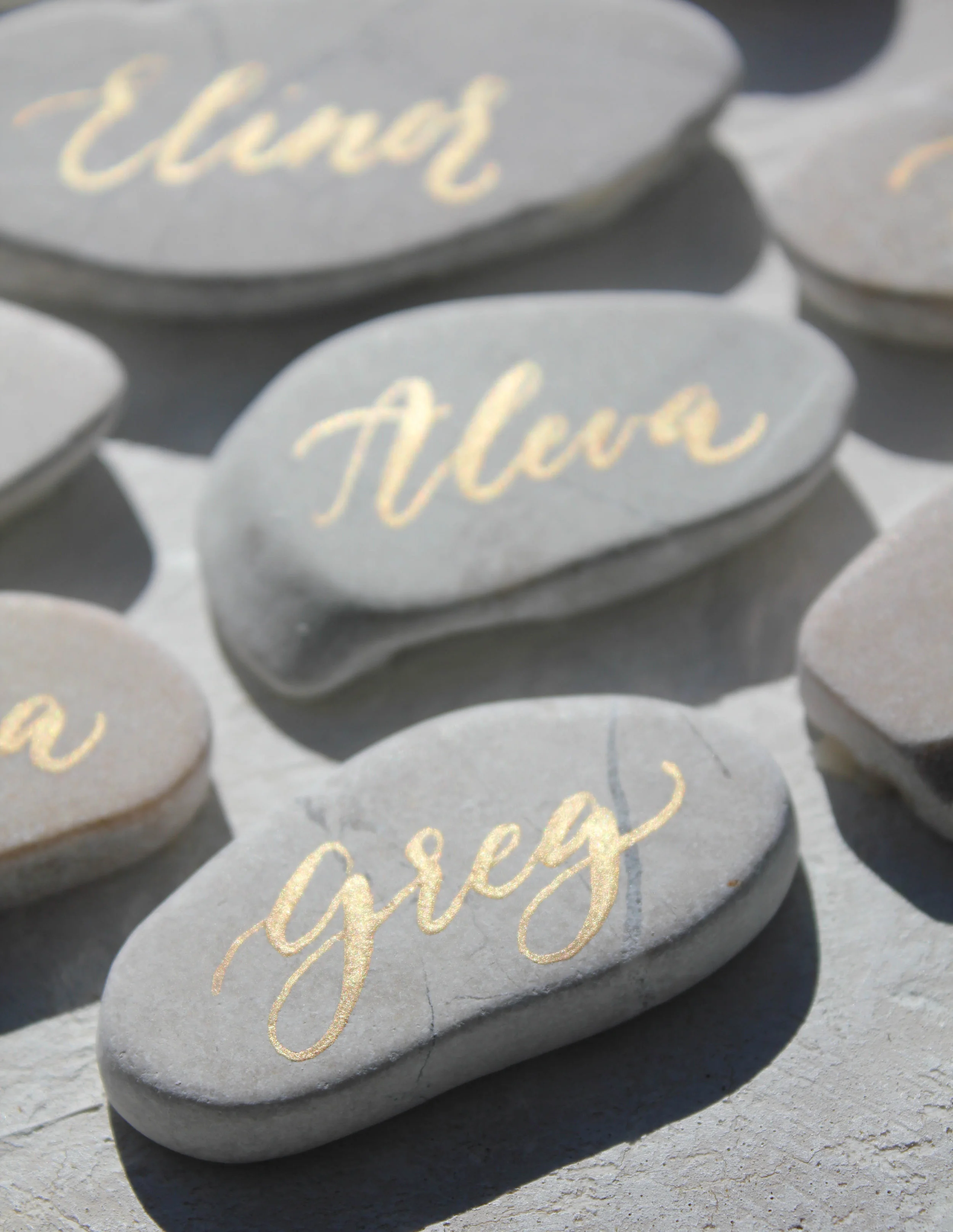 unique wedding place card idea | gold calligraphy