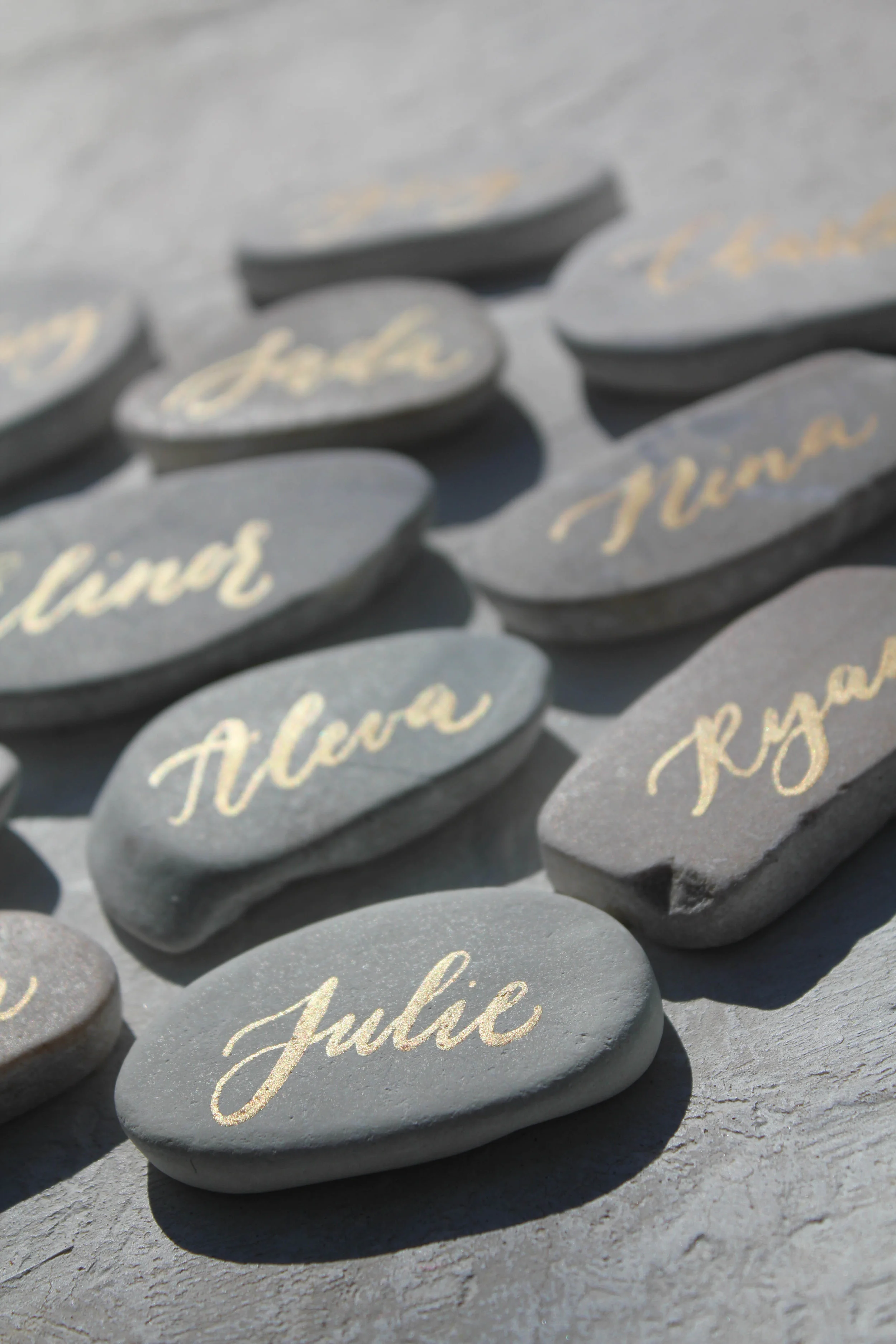 gold calligraphy | stone place card | stone escort card
