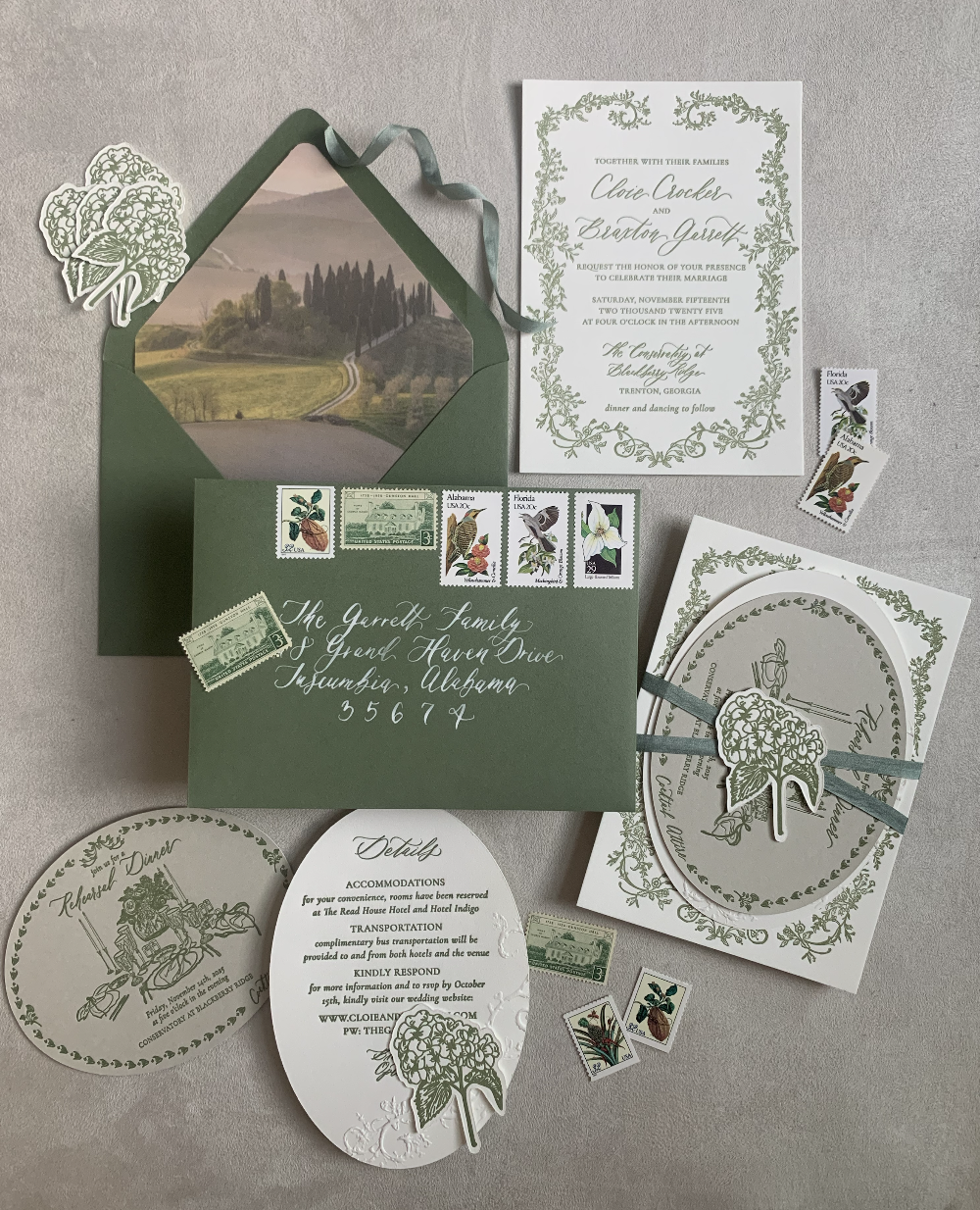 letterpress wedding invitations featuring hand illustrated crest and hydrangeas with calligraphy addressing and vintage postage