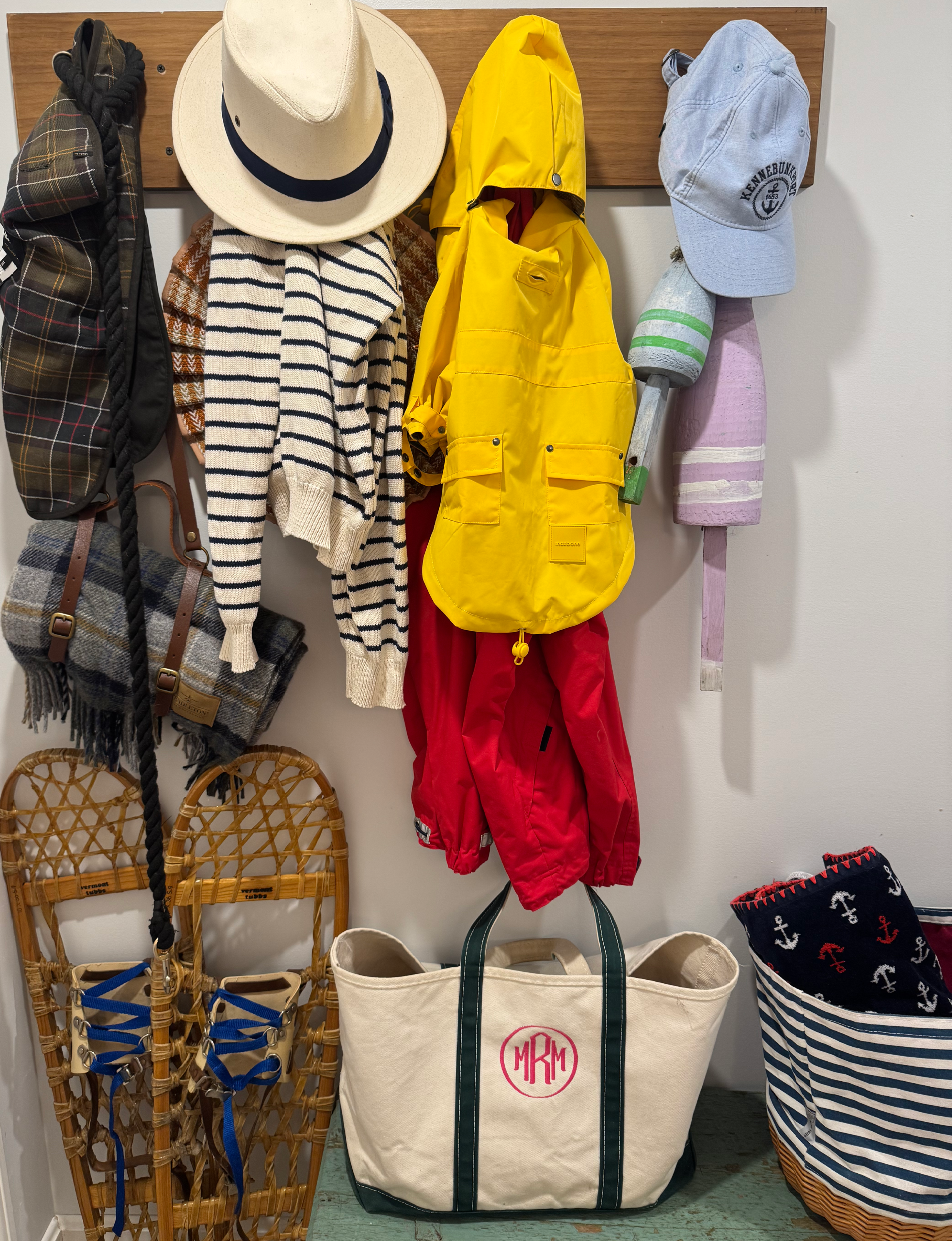 coat rack with summer outfits and gear