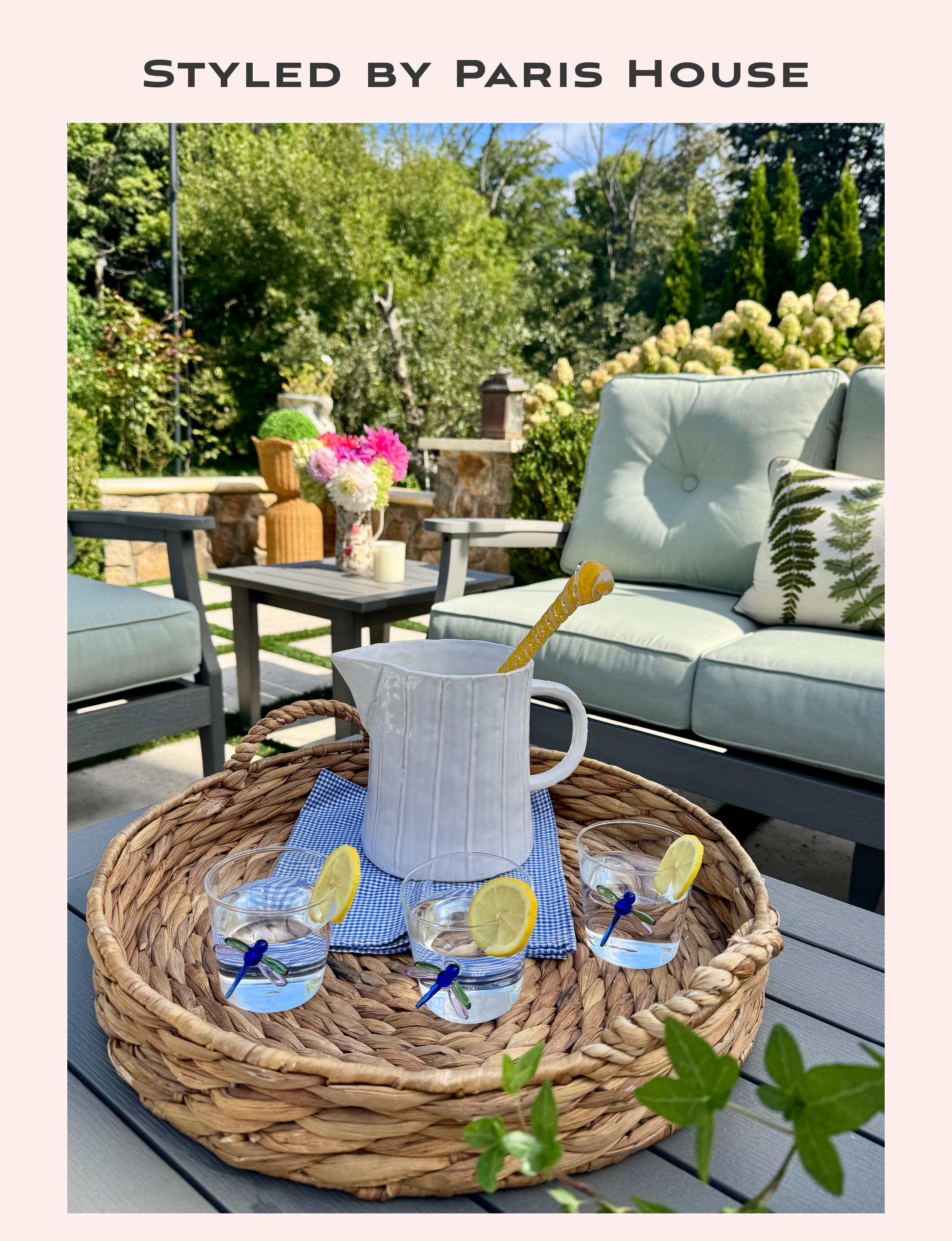 water with lemon served in an outdoor seating area