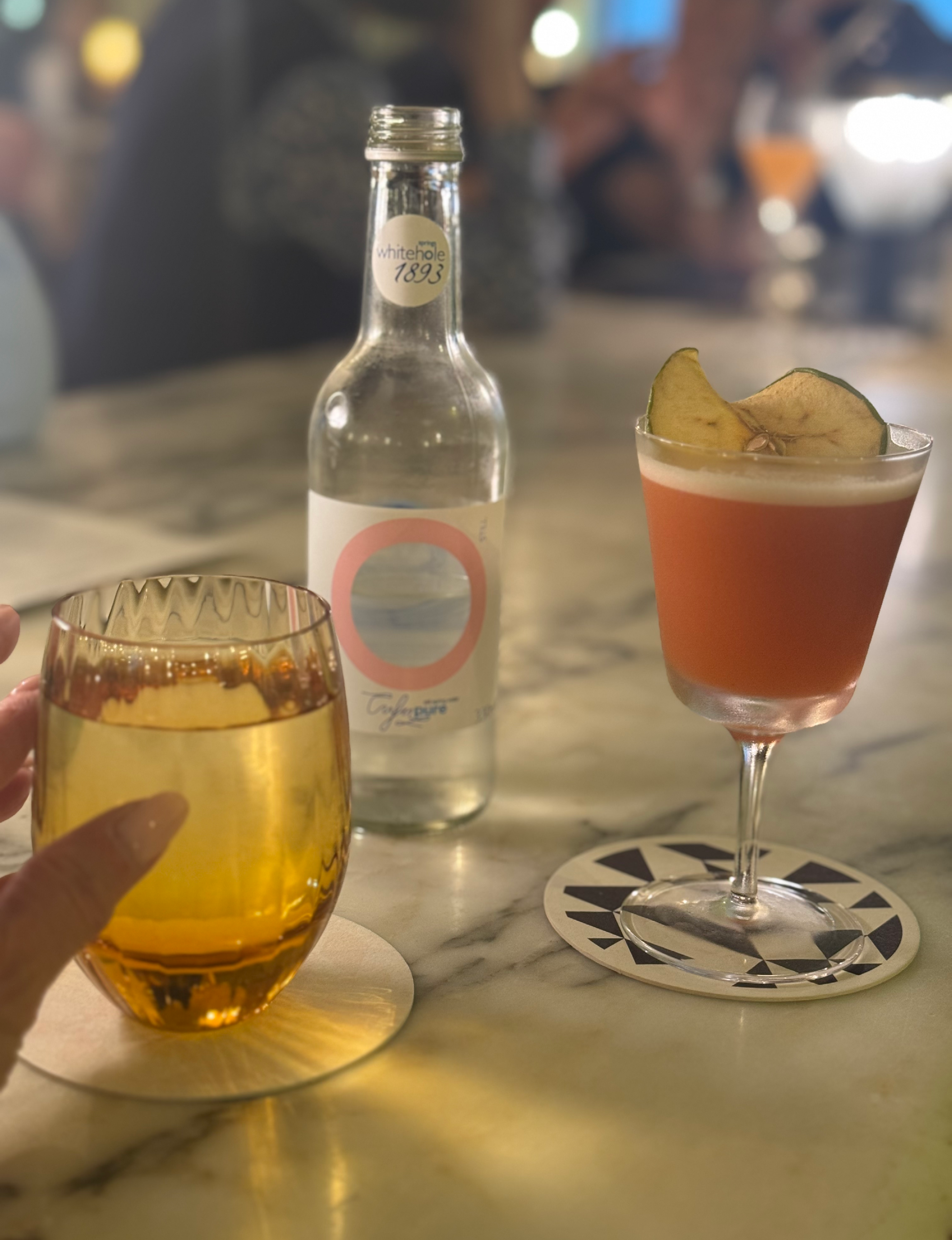 A Bourbon cocktail infused with cinnamon and apples, with a few other ingredients