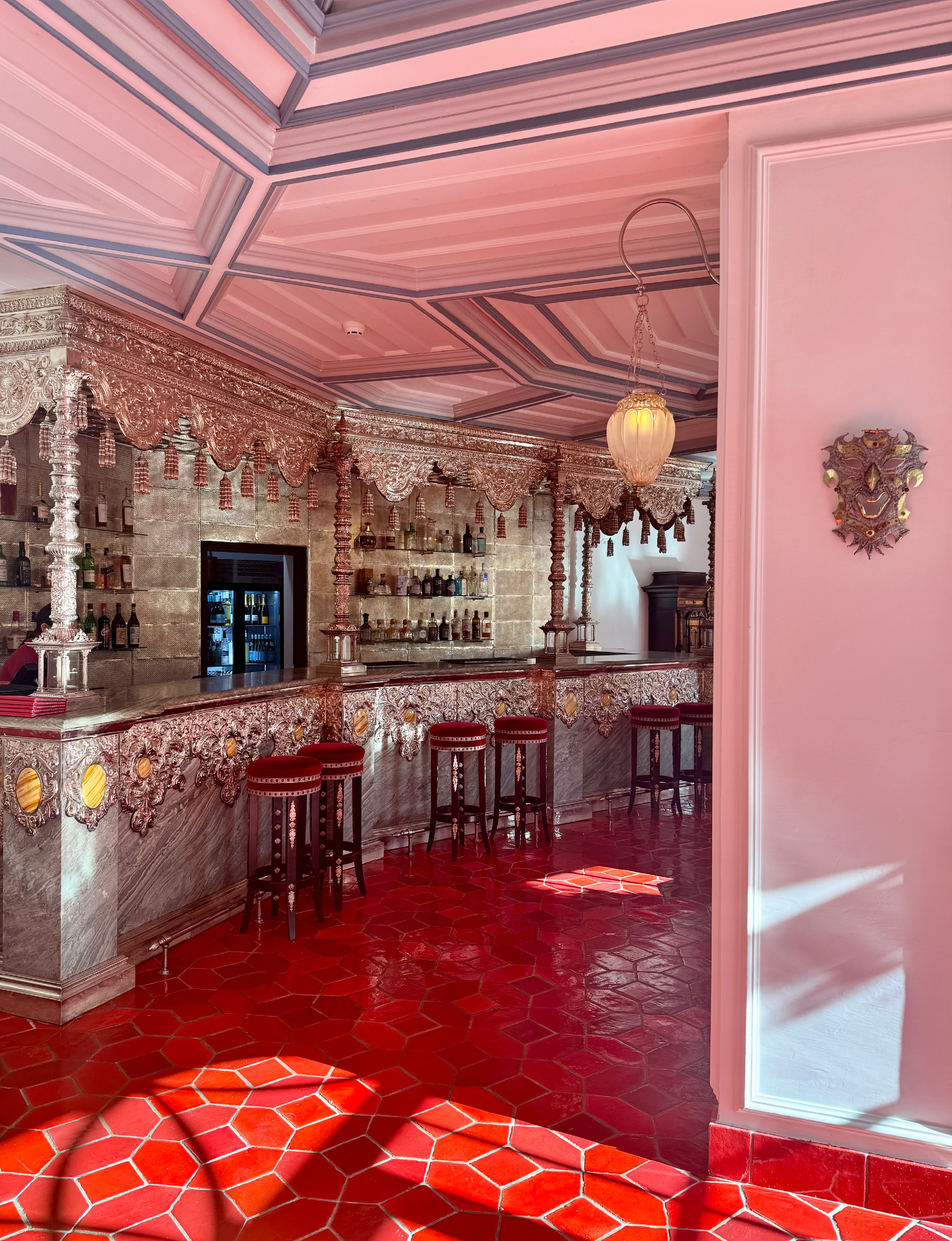 Melides Portugal Hotel Vermelho Bar ornate with red floors pink walls and ceiling