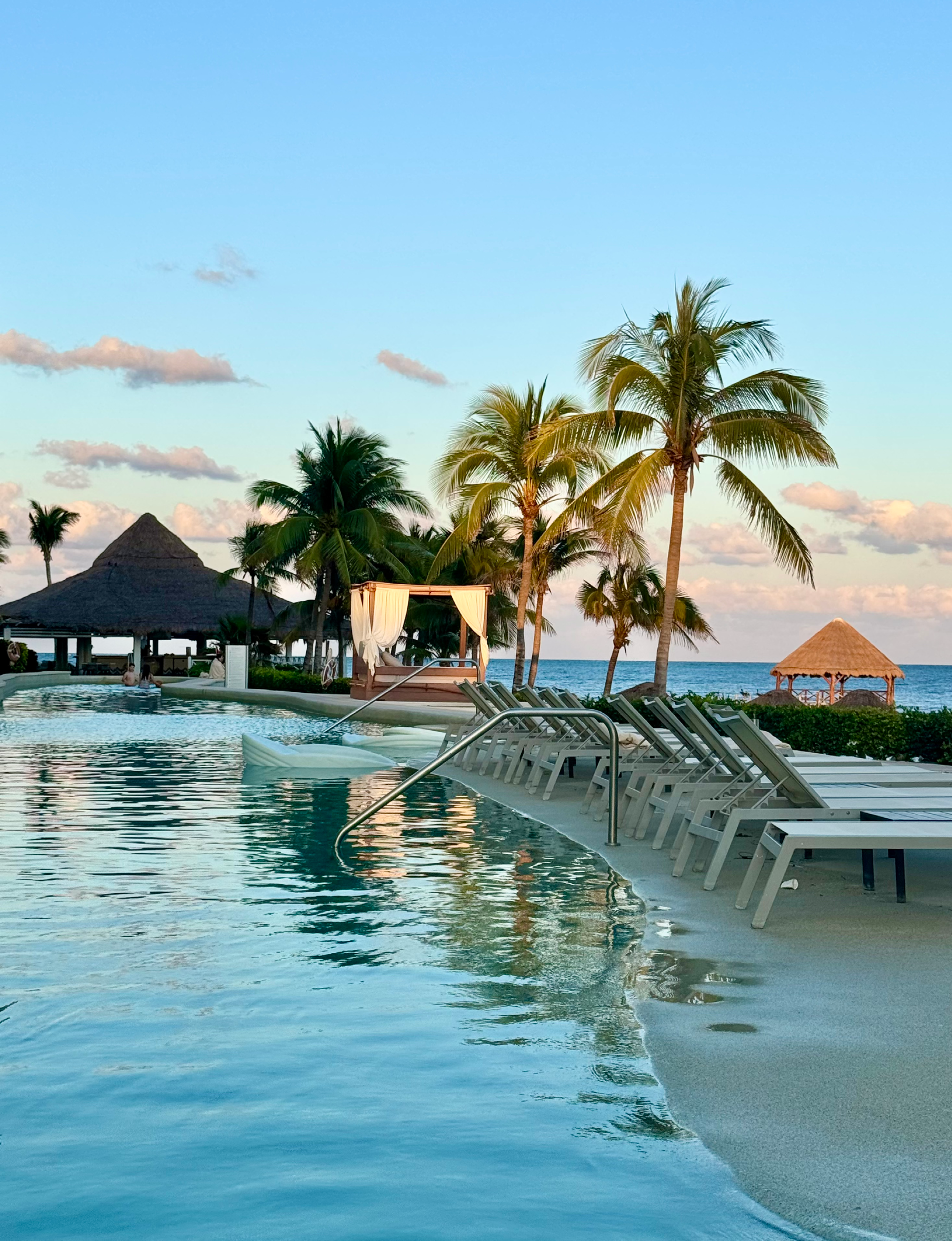 oceanfront swimming pool and lounge area at luxurious Riviera Maya Mexico