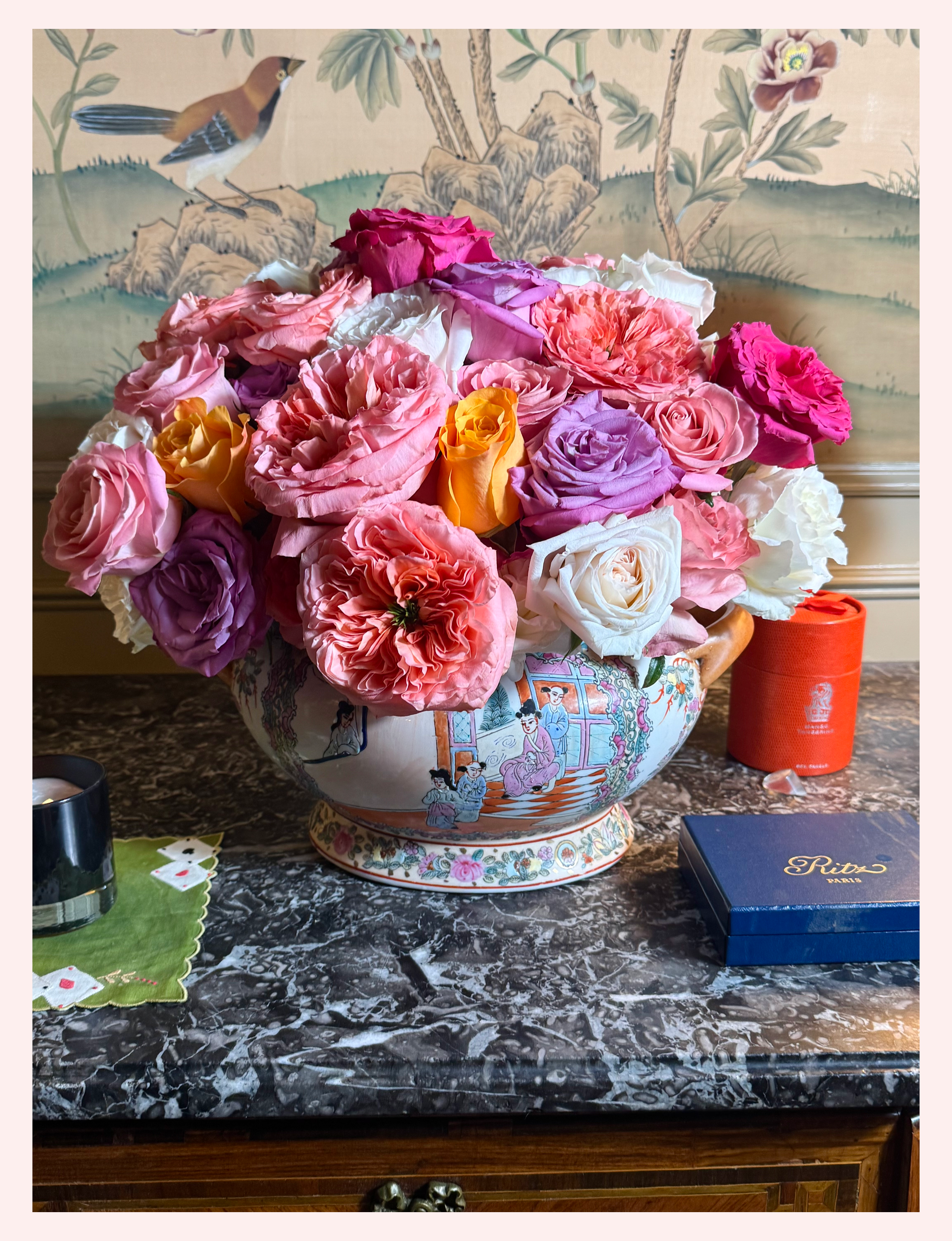 Floral arrangement made with roses pink white blue purple
