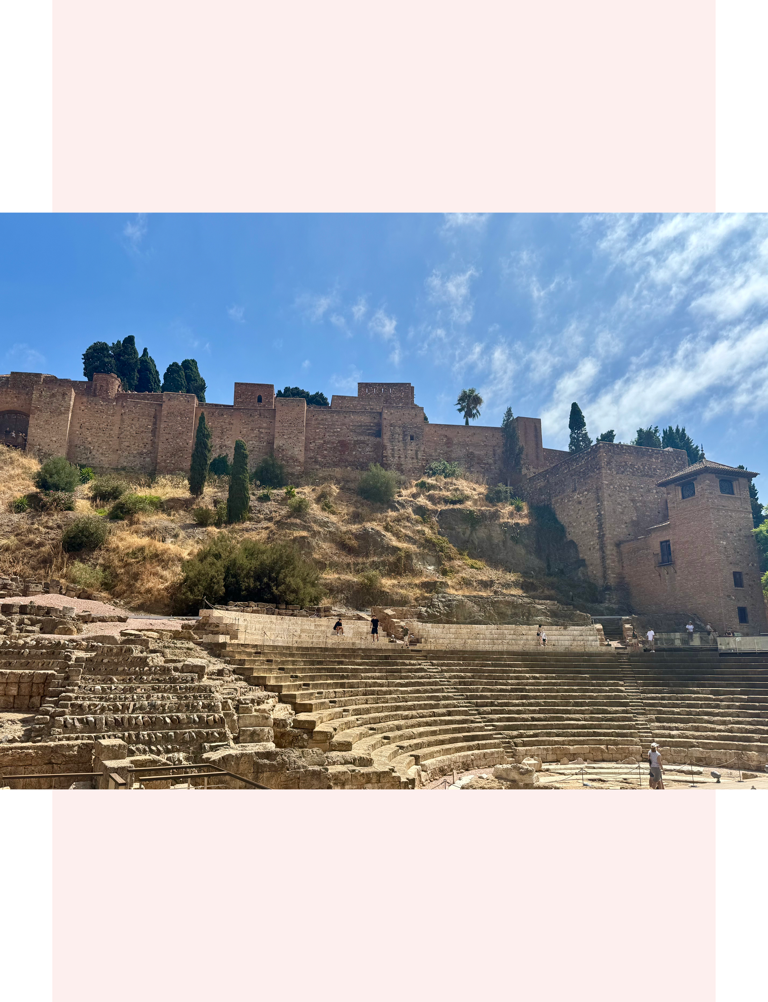 Alcazaba of Málaga, a historic Moorish palatial fortress located in southern Spain. Directly below the fortress is the Roman Theatre
