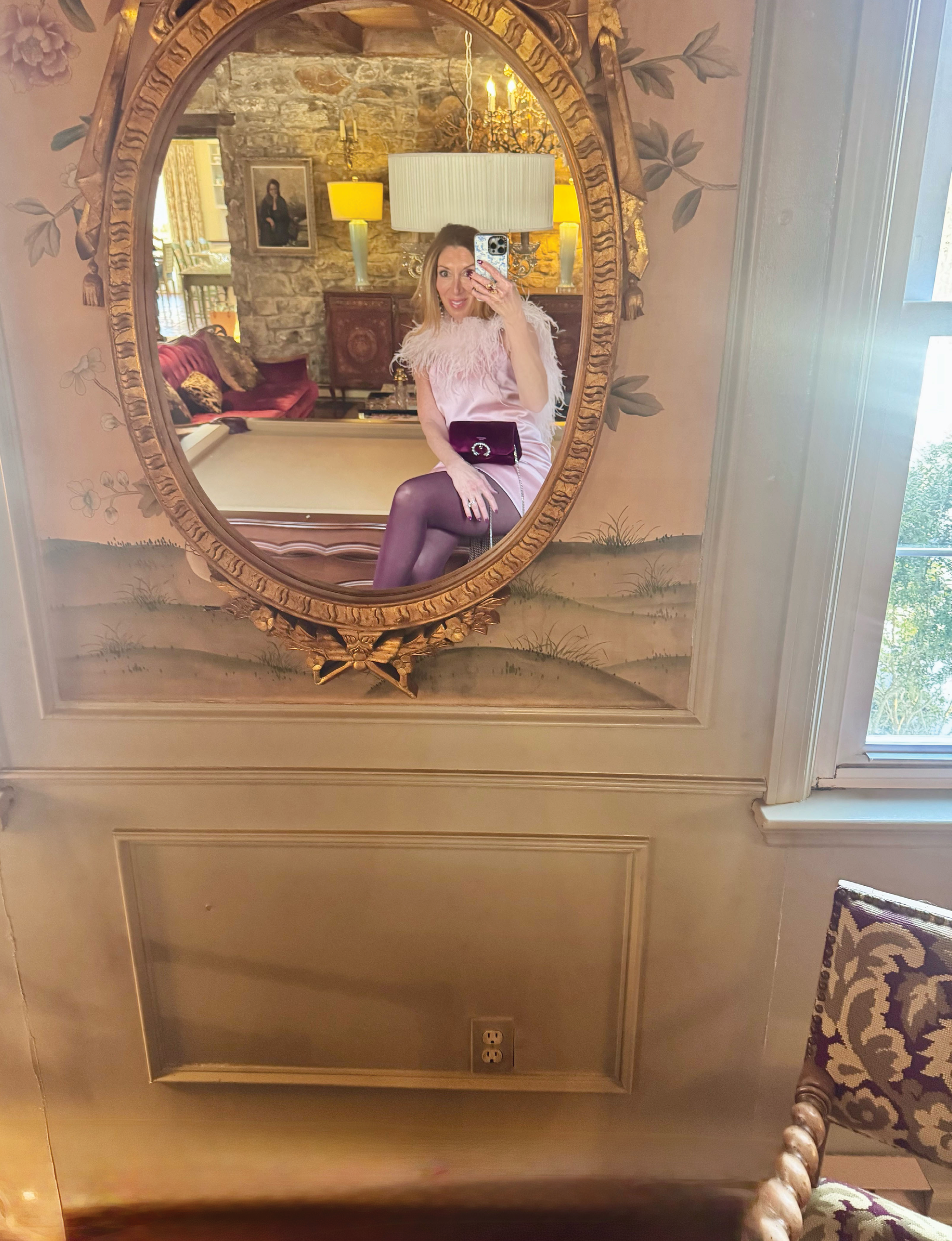 The Paris House owner Michele Rosenthal in pink and merlot tights