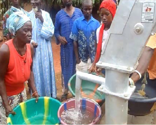 Right: EnviroOne is re-igniting the flames of hope and dignity of those that cannot afford to pay for clean water. We hope to drill water wells in all districts.
