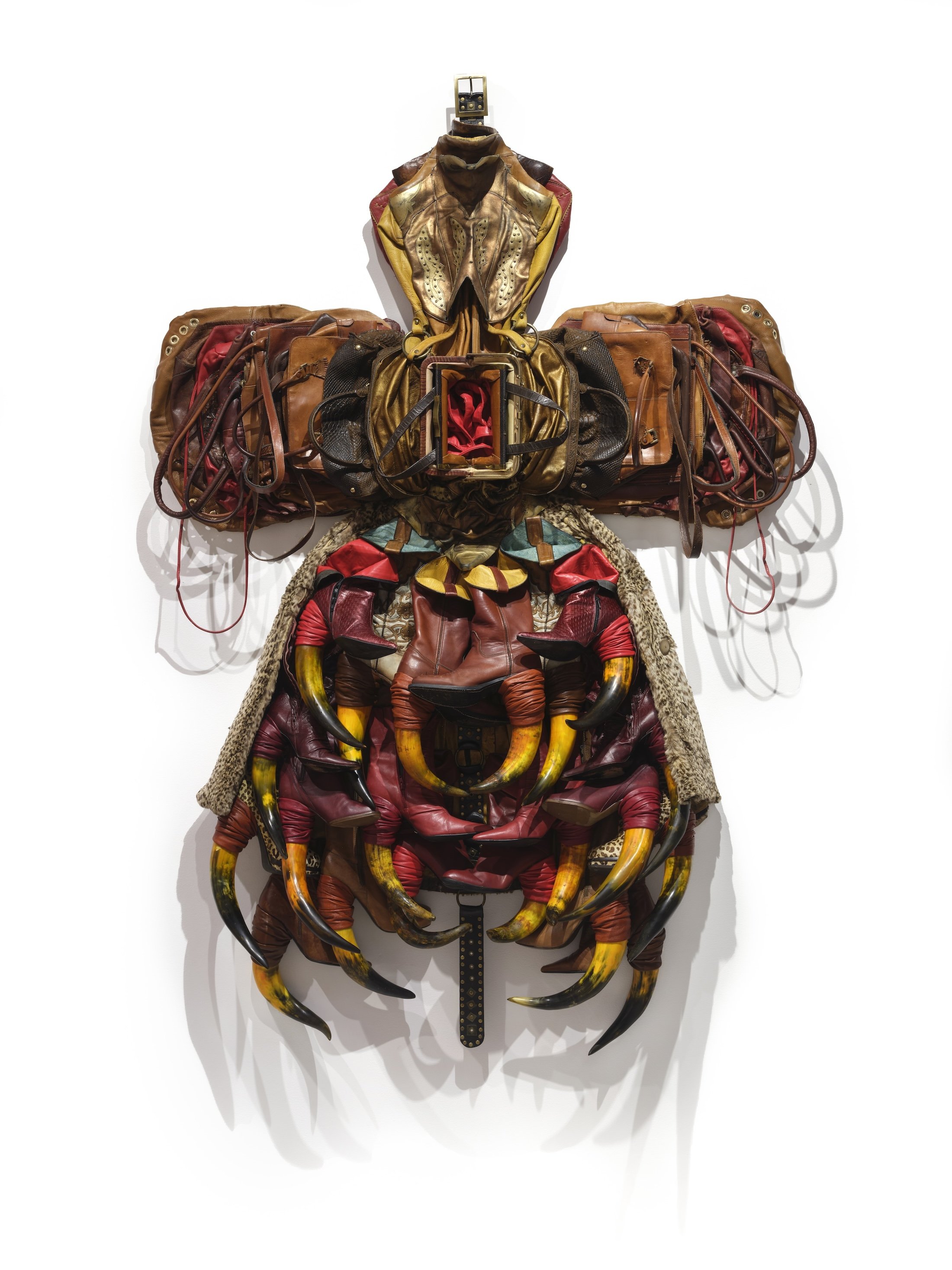   Anindita Dutta  New Haven, CT  @aninditadutta.studio    Hail of Opened Purses,  2025 Used leather bags, boots, hand dyed animal horn 79 x 58 x 81/2 inches  Anindita Dutta received her MFA in Sculpture from the University of Iowa in 2005 and was sel