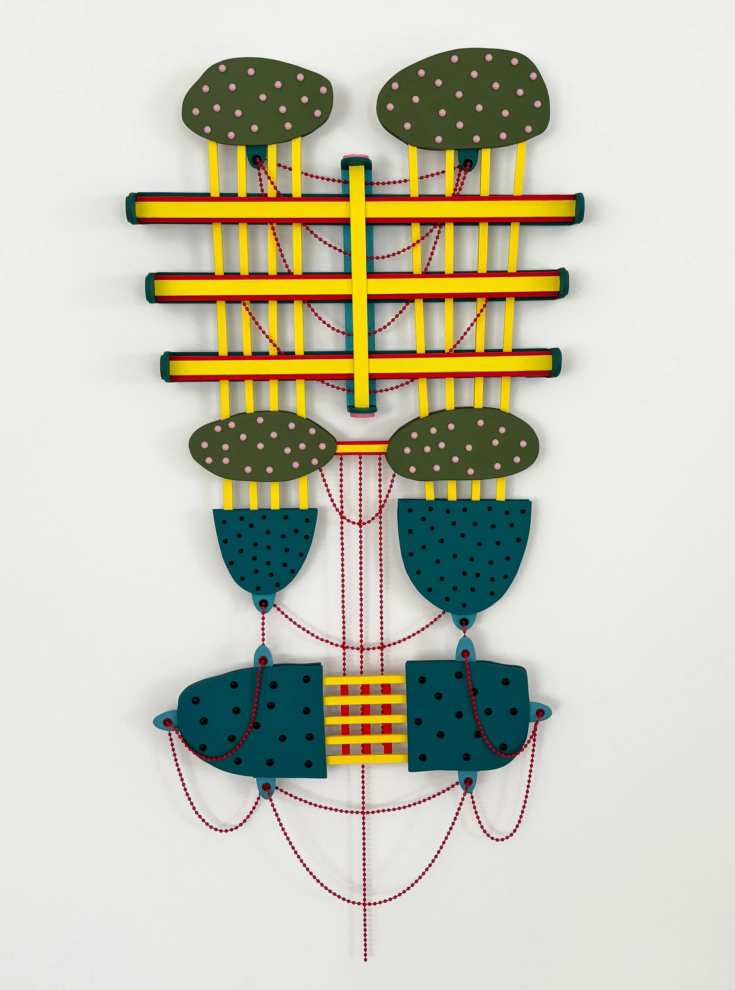   Lanie Gannon&nbsp;  Nashville, TN   Marquee , 2025 Paper board, acrylic paint, ball chain 21 x 13 x 2.5 inches  Lanie Gannon worked in wood sculpture before turning to sculptural paper forms during her time as a Visiting Artist at the American Acad