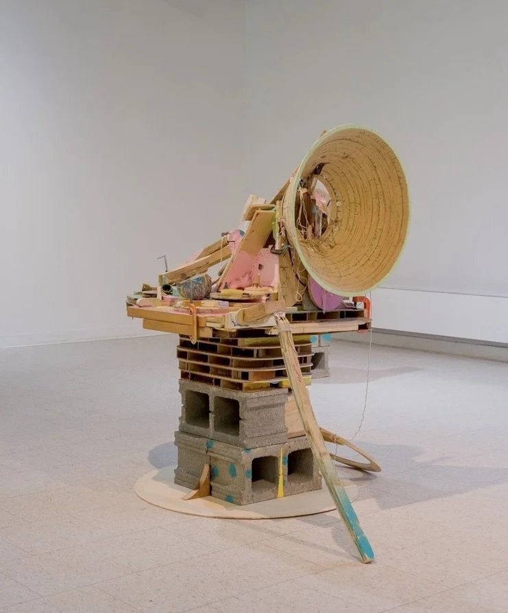   Travis Townsend  Lexington, KY&nbsp;  @travistownsendart    Renovated Model for a (mid-life) Space Craft,  2025 Wood, reclaimed door, concrete blocks, paint, clay, clamps, string, and an assortment of studio stuff 60 x 60 x 36&nbsp; inches  Travis 