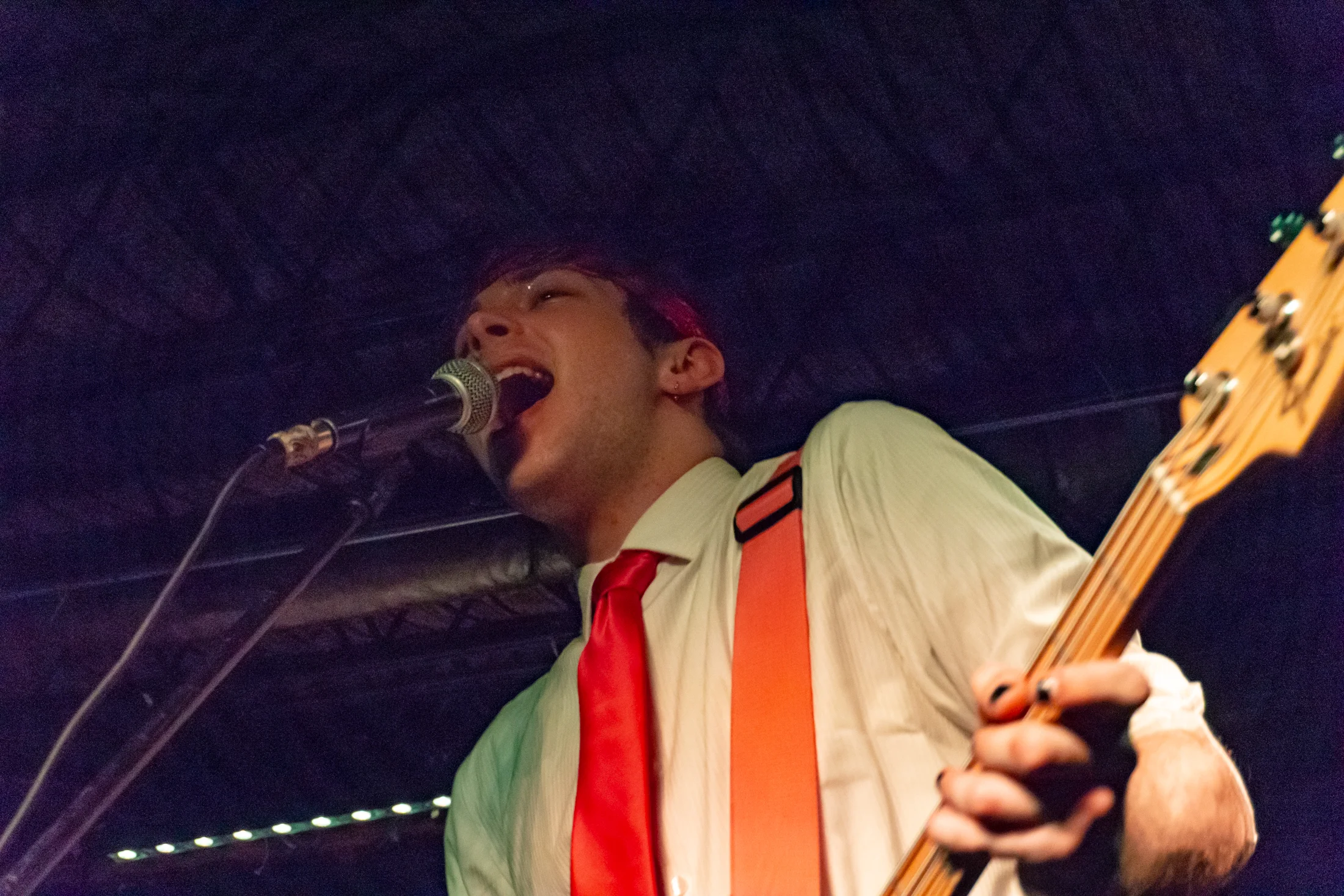 Braden Goyke, Scamper. bassist, during a performance at Gabe’s Oasis in Iowa City. Photo by Melinda Ehrp