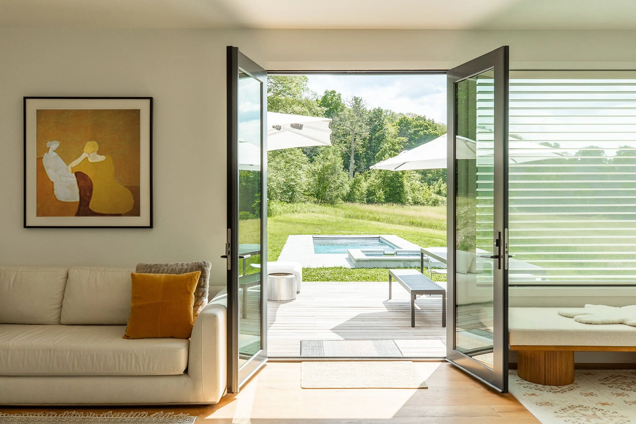 25 - Sun Room towards Pool_replaced painting.jpg