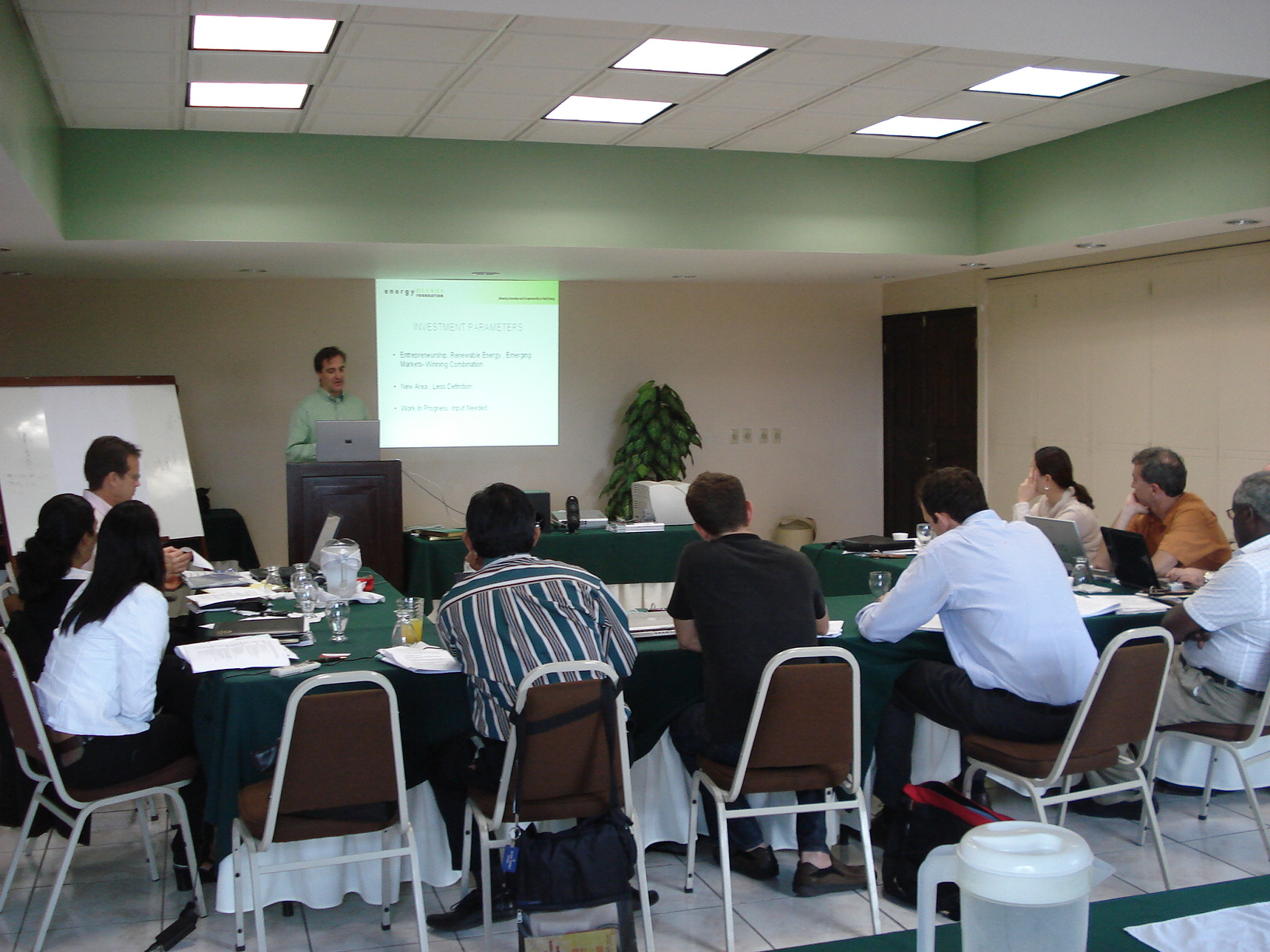 Titus presenting information to the group of solar entrepreneurs
