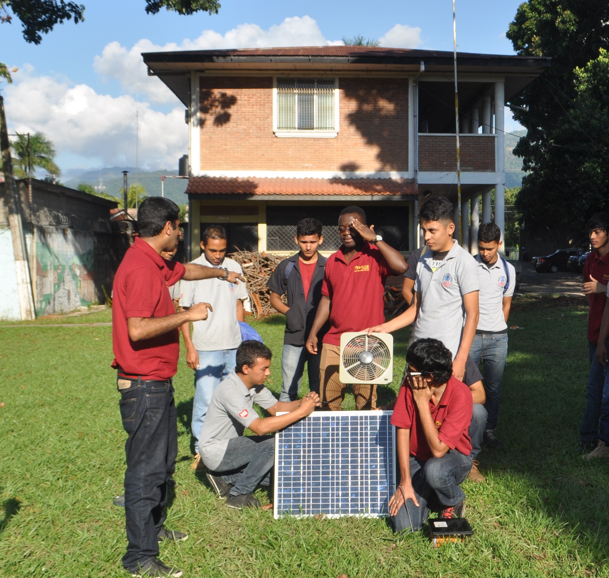 Three UML Students teaching local studnets.jpg