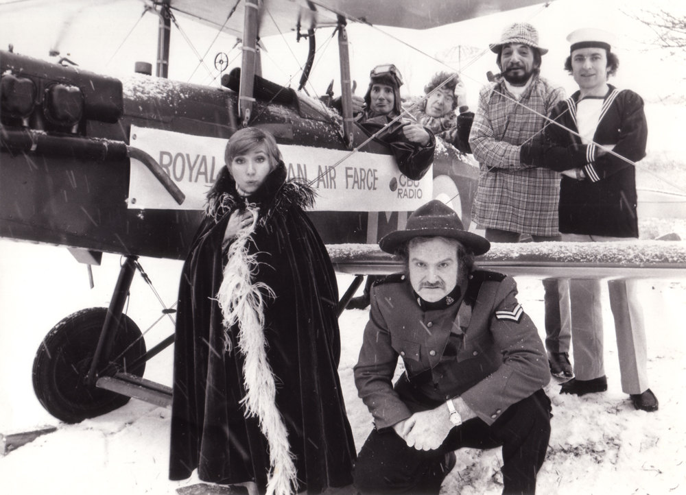 An early Air Farce promotional still: Luba Goy and Dave in the foreground; Don Ferguson, John Morgan, Martin Bronstein, and Roger Abbott in the background - 1974