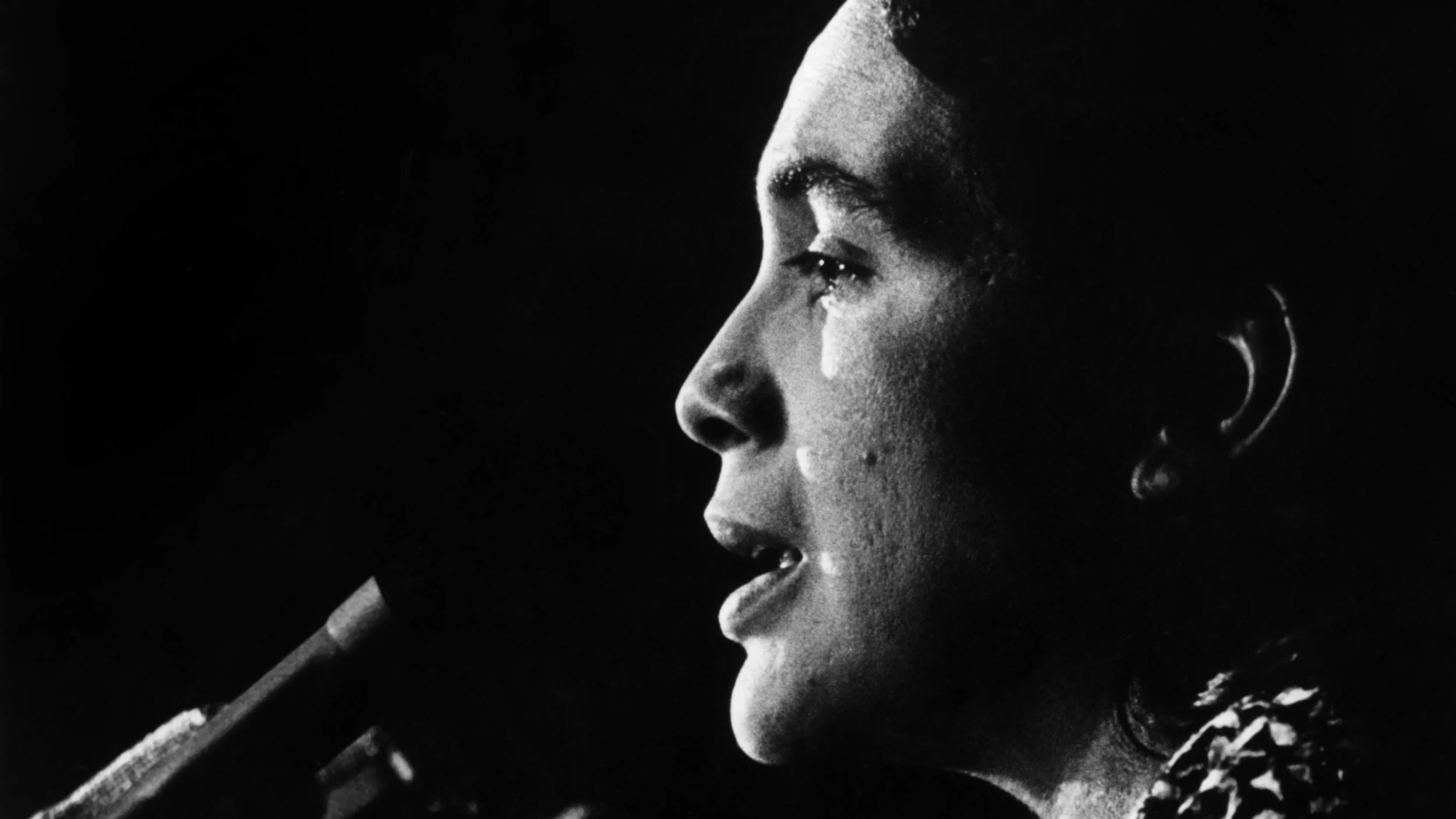 #4 - Dolores Huerta speaks at the podium. c1970s. Courtesy of Walter P. Reuther Library Archives of Labor and Urban Affairs Wayne State University.jpg
