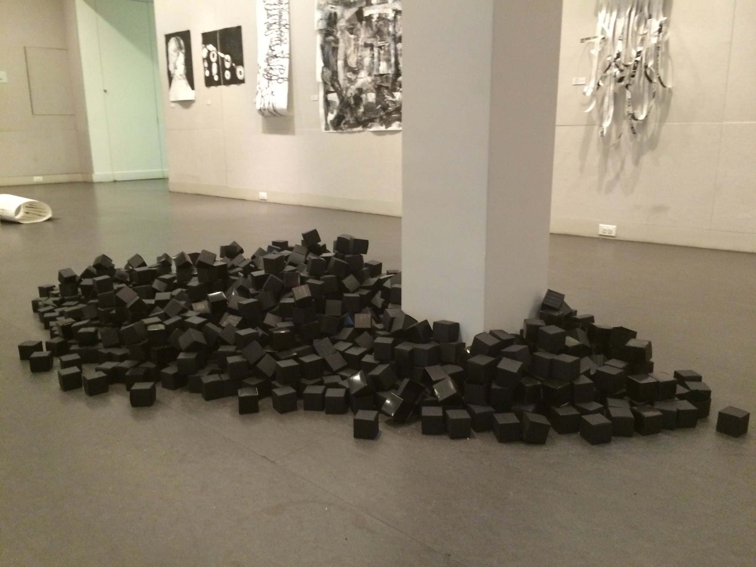 11.Center Gallery Installation, Manheimer_In Memoriam Looking for the Black Box 2016, paper boxes with acrylic paint.jpg