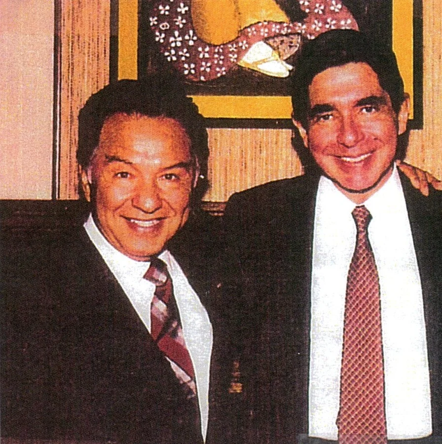 Augusto with Óscar Arias