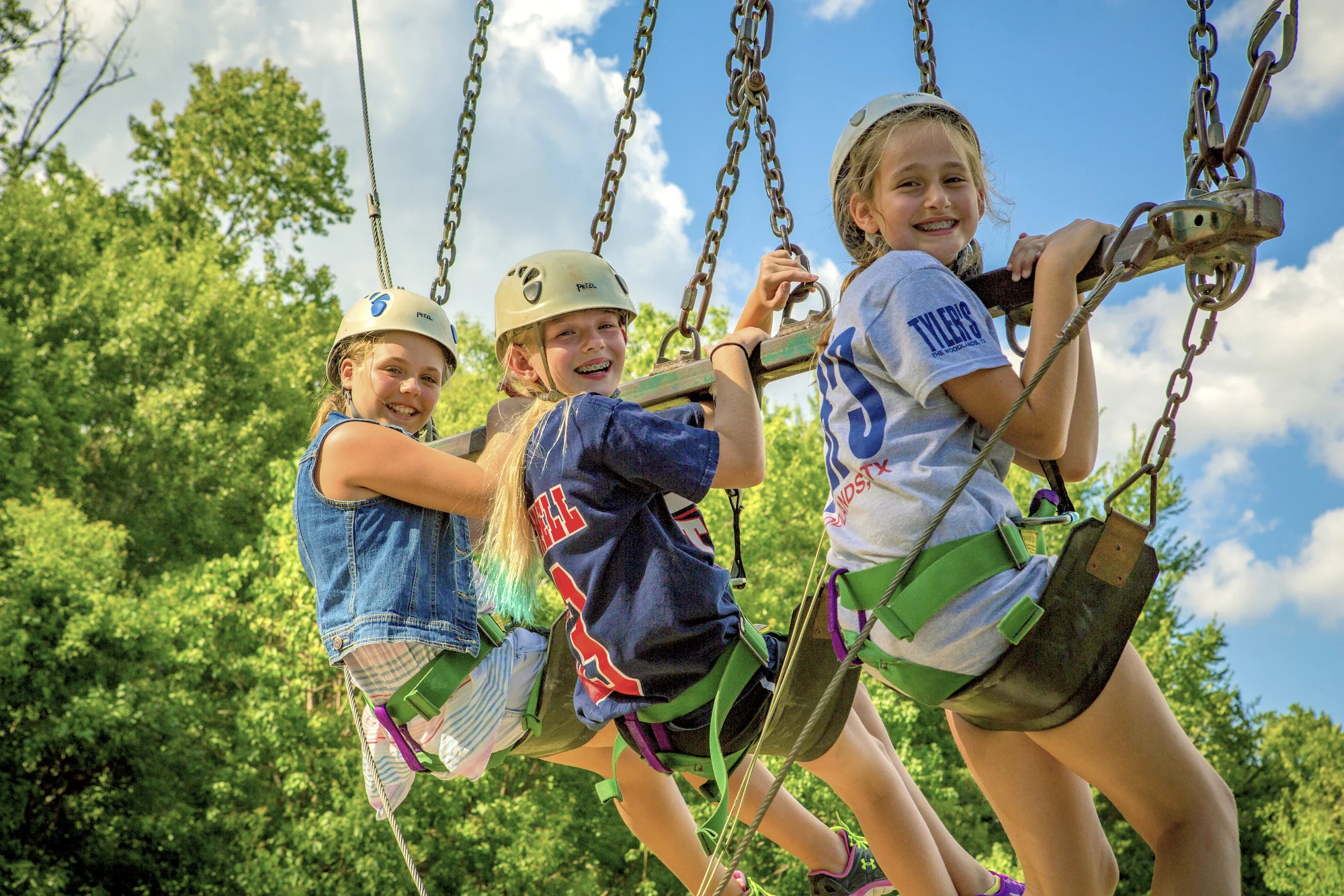 girls-swing-smiling.jpg