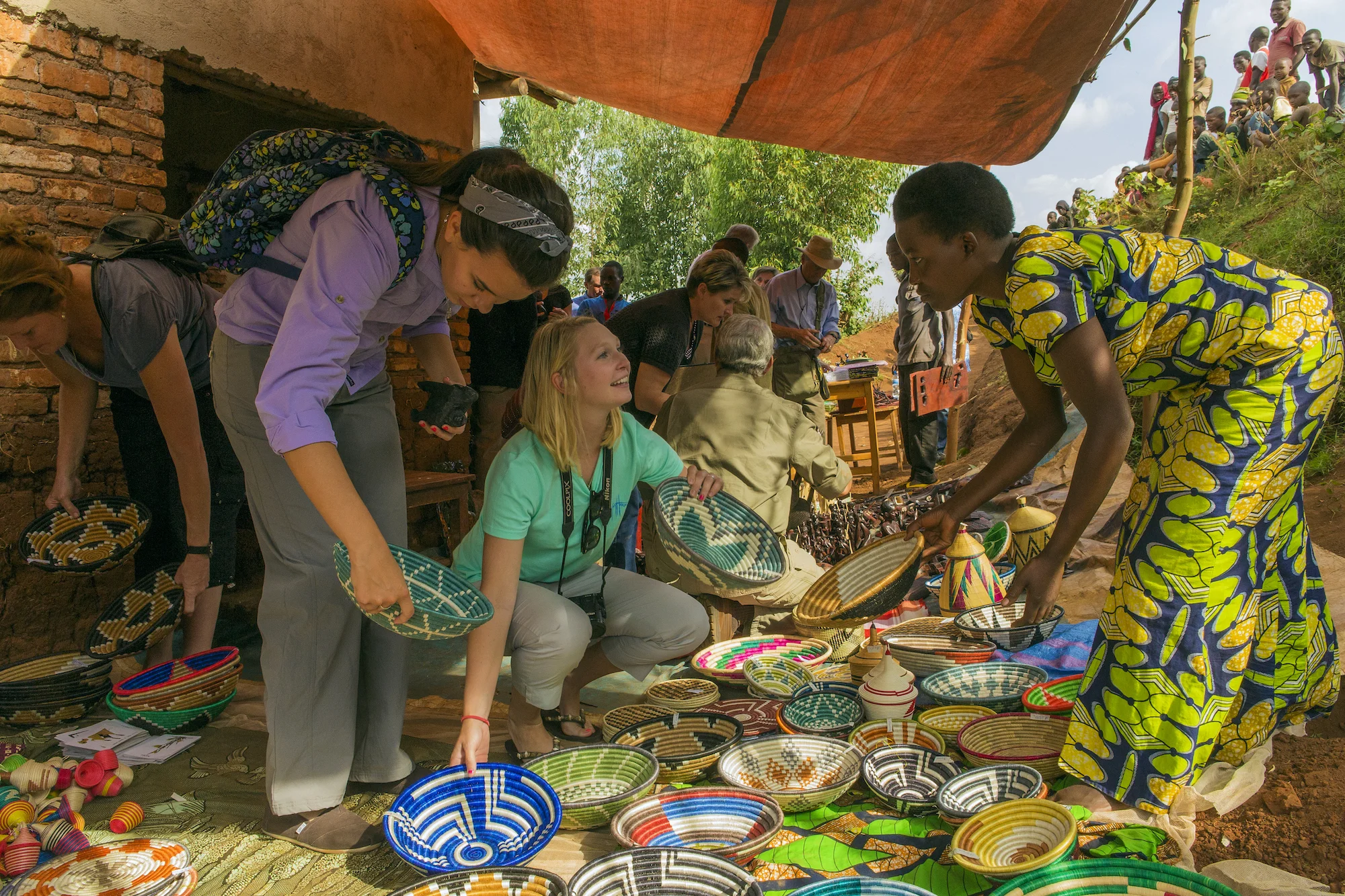 girls-buy-baskets-rwanda-village.jpg