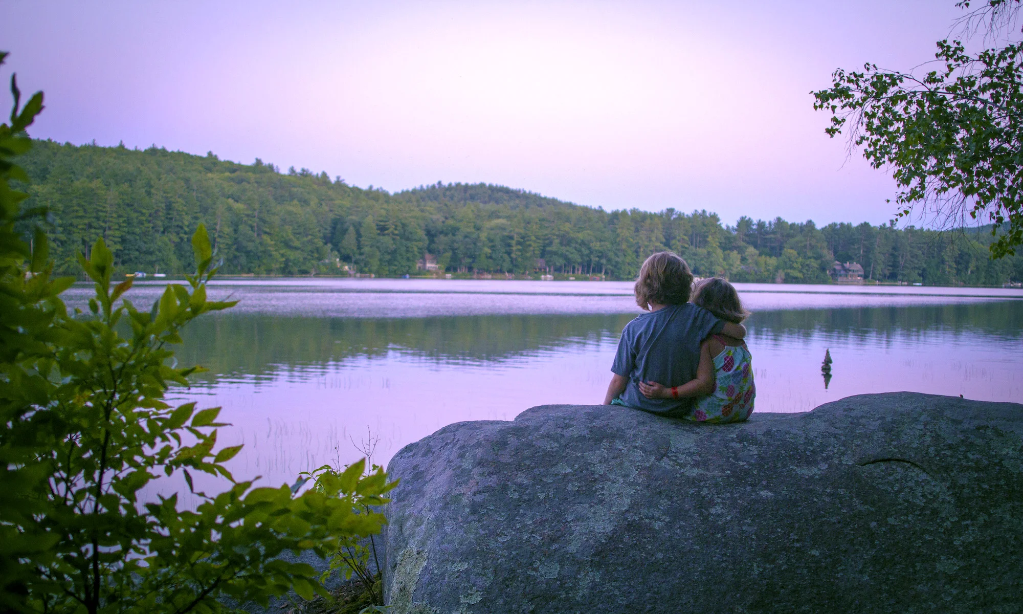 girls-look-over-lake-evening-brighter.jpg