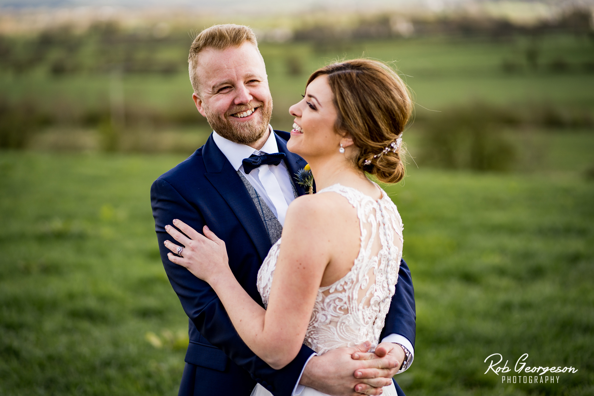 bride and groom portrait in the field at bashall barn