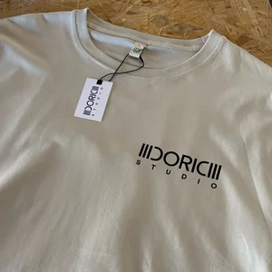 Buttery Tee (Bone/Off White) Back Print — Doric Studio