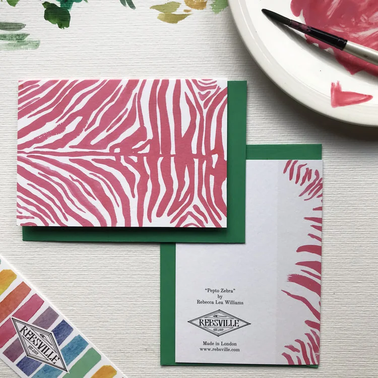 rebsville-card-zebra-pepto-pink-watercolour-animal-print-art-rebecca-lea-williams-flatlay.jpg