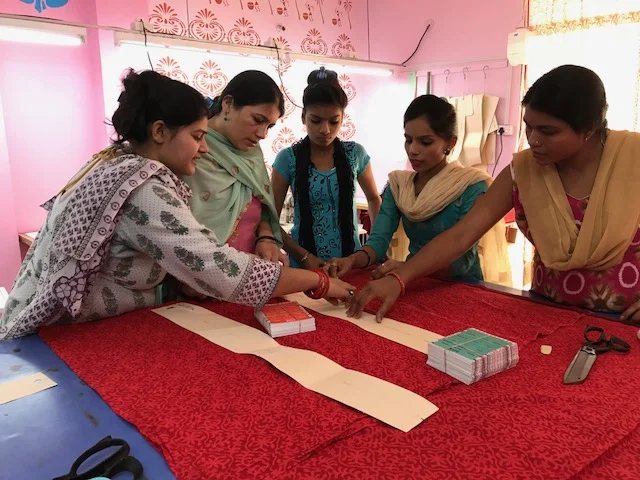 Day8 tailors cutting.jpg