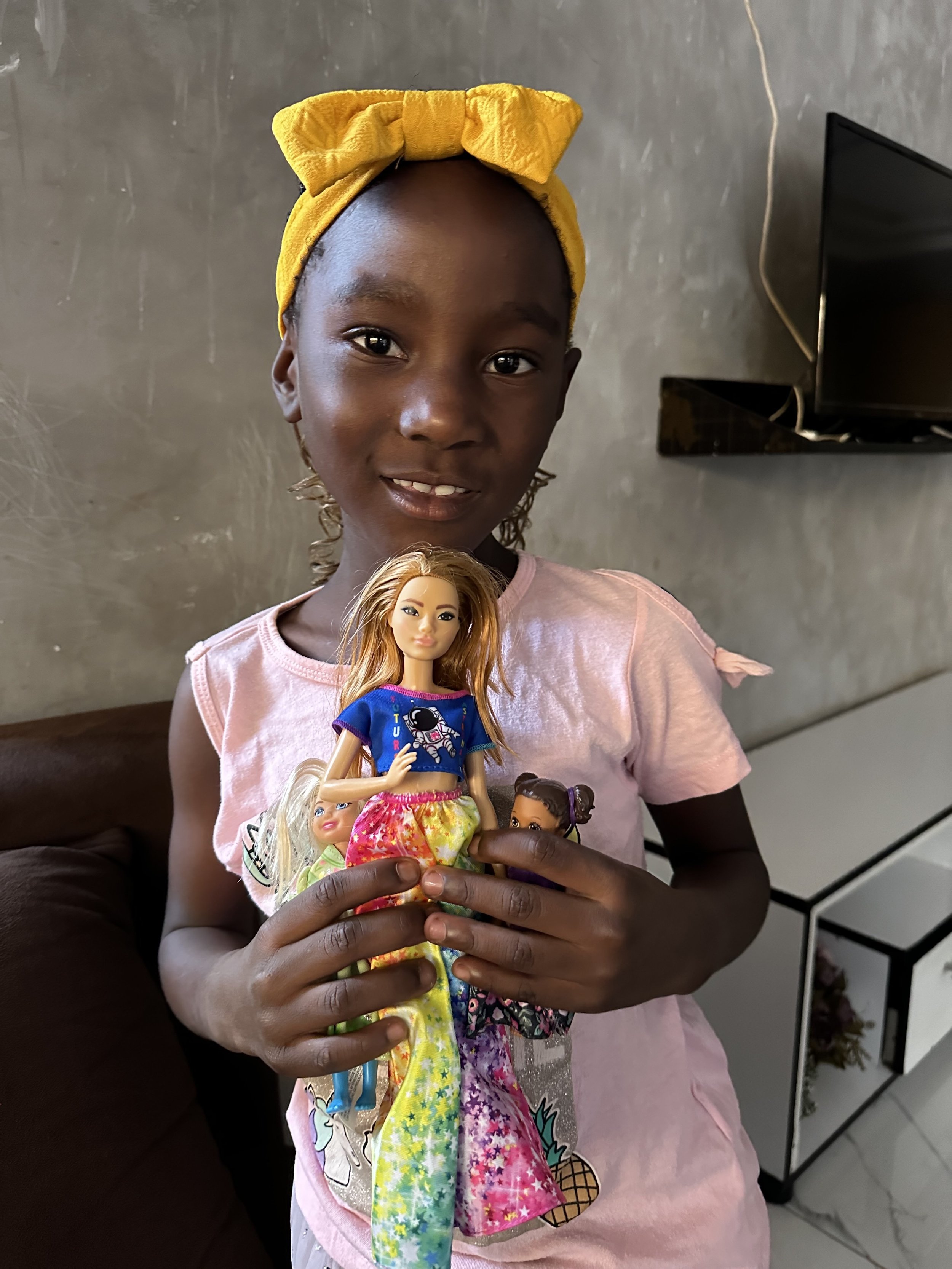 Little girl with Barbie.jpg