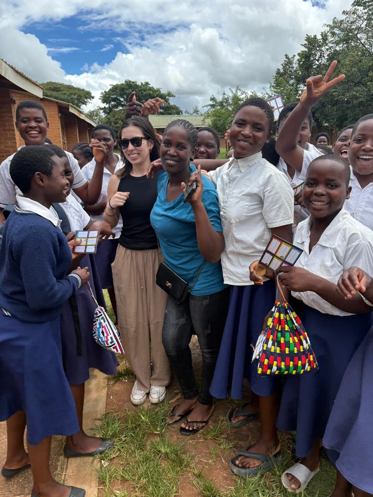 Claire with school girls.jpeg