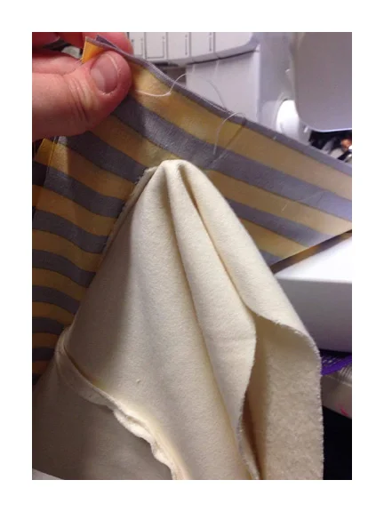 See be VERY careful to keep the interior fabric of the jacket out of the way while stitching the two pocket pieces together.
