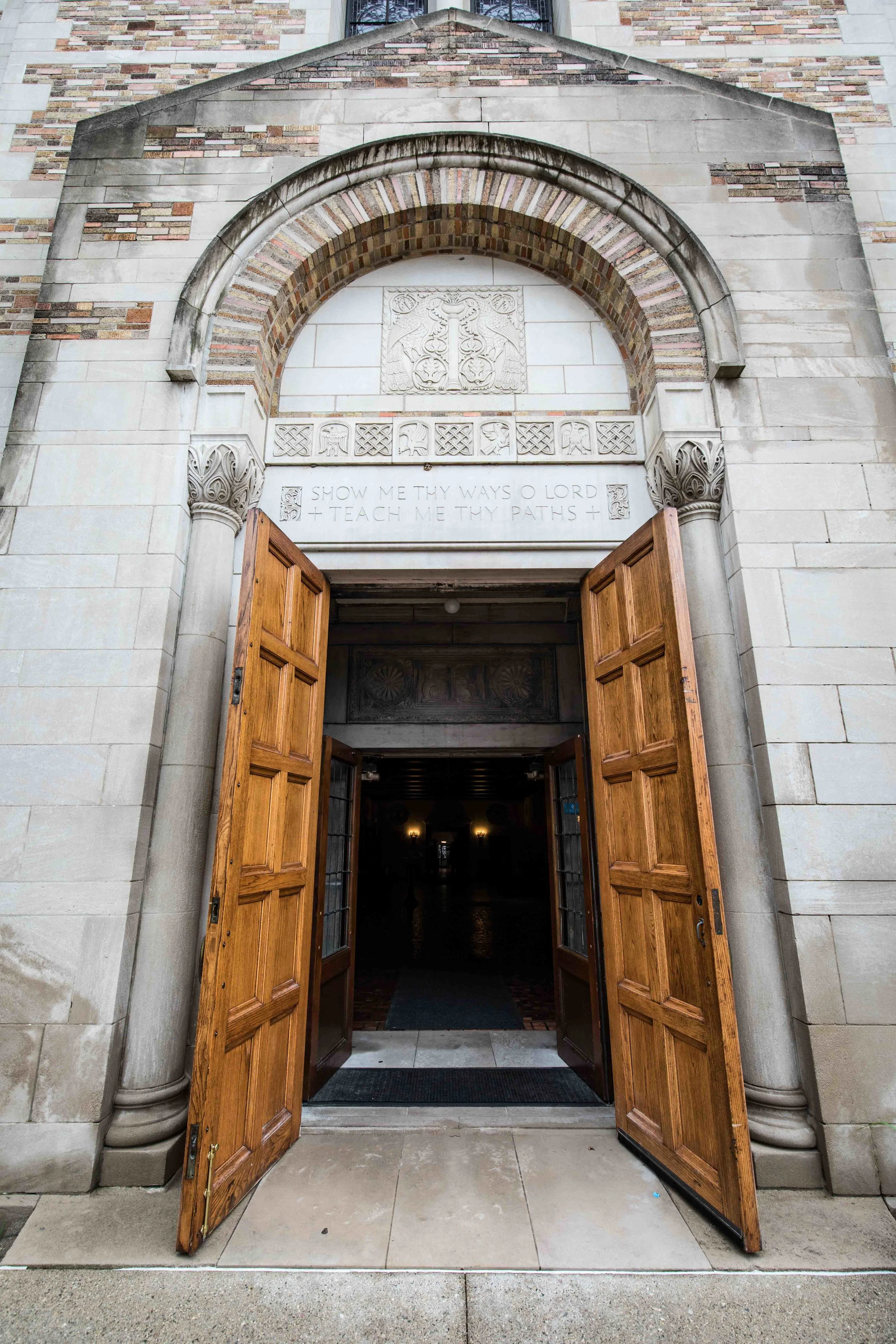 Tall wooden church doors