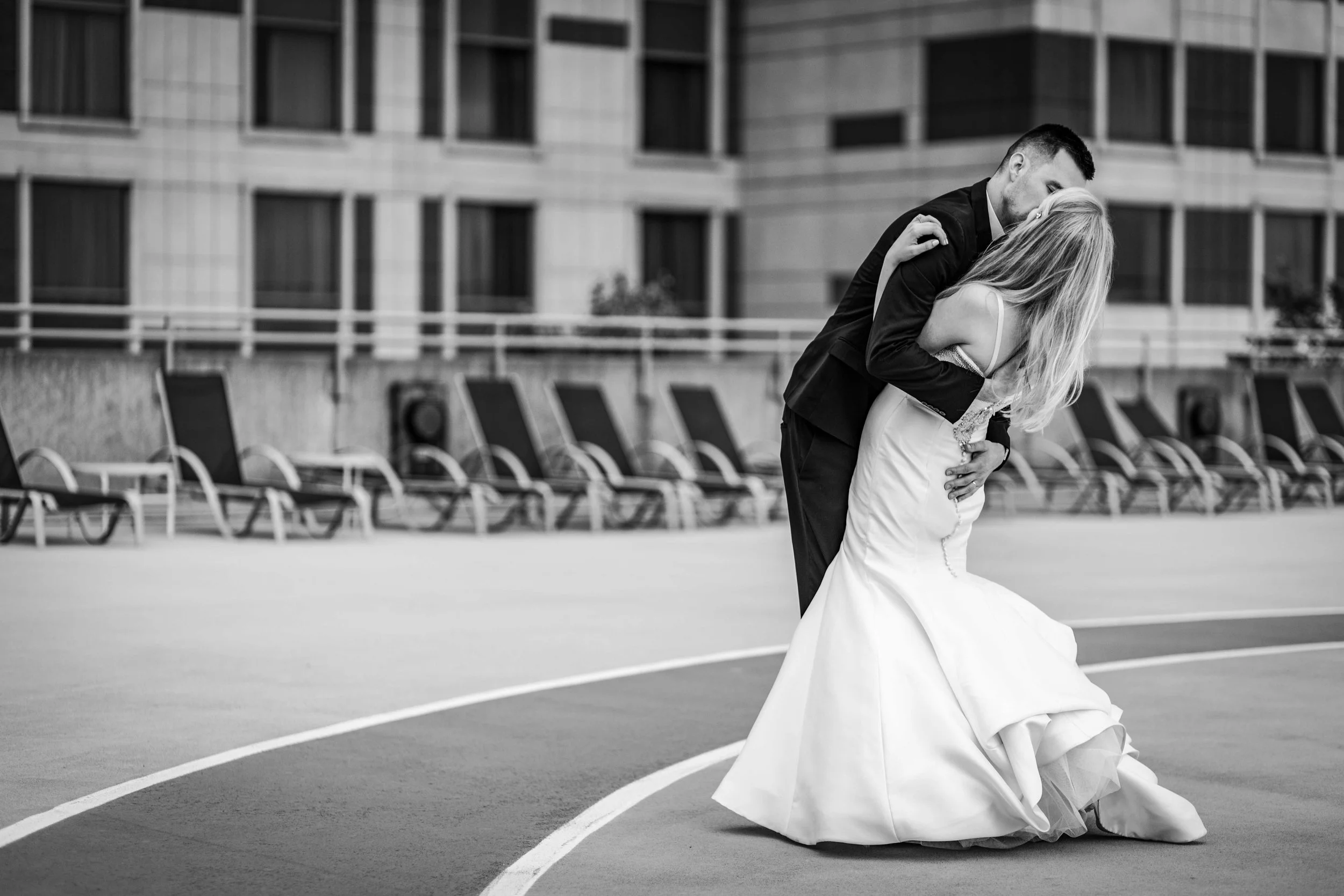 A rooftop kiss for the bride