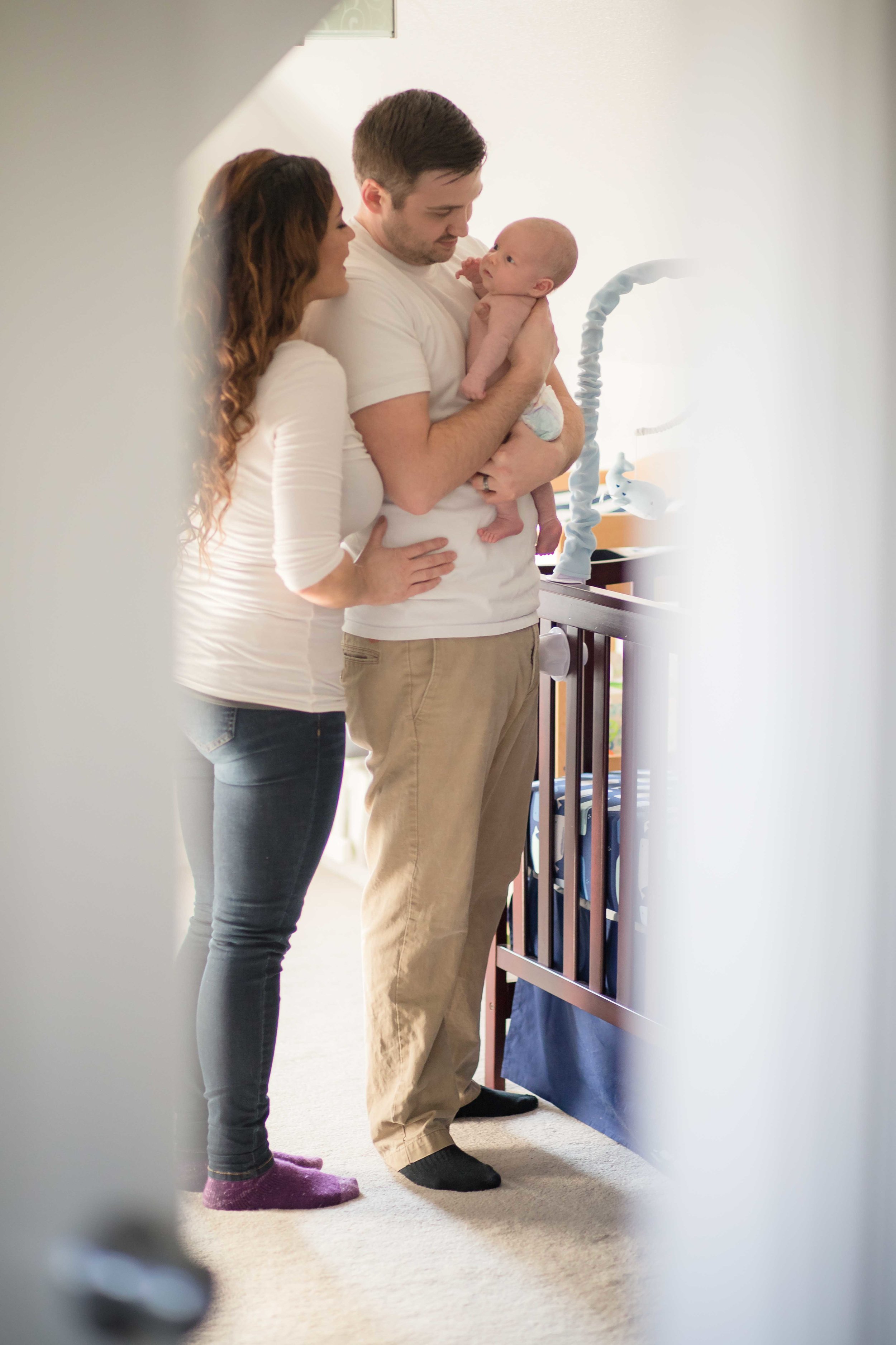  mother and father in newborns nursery  