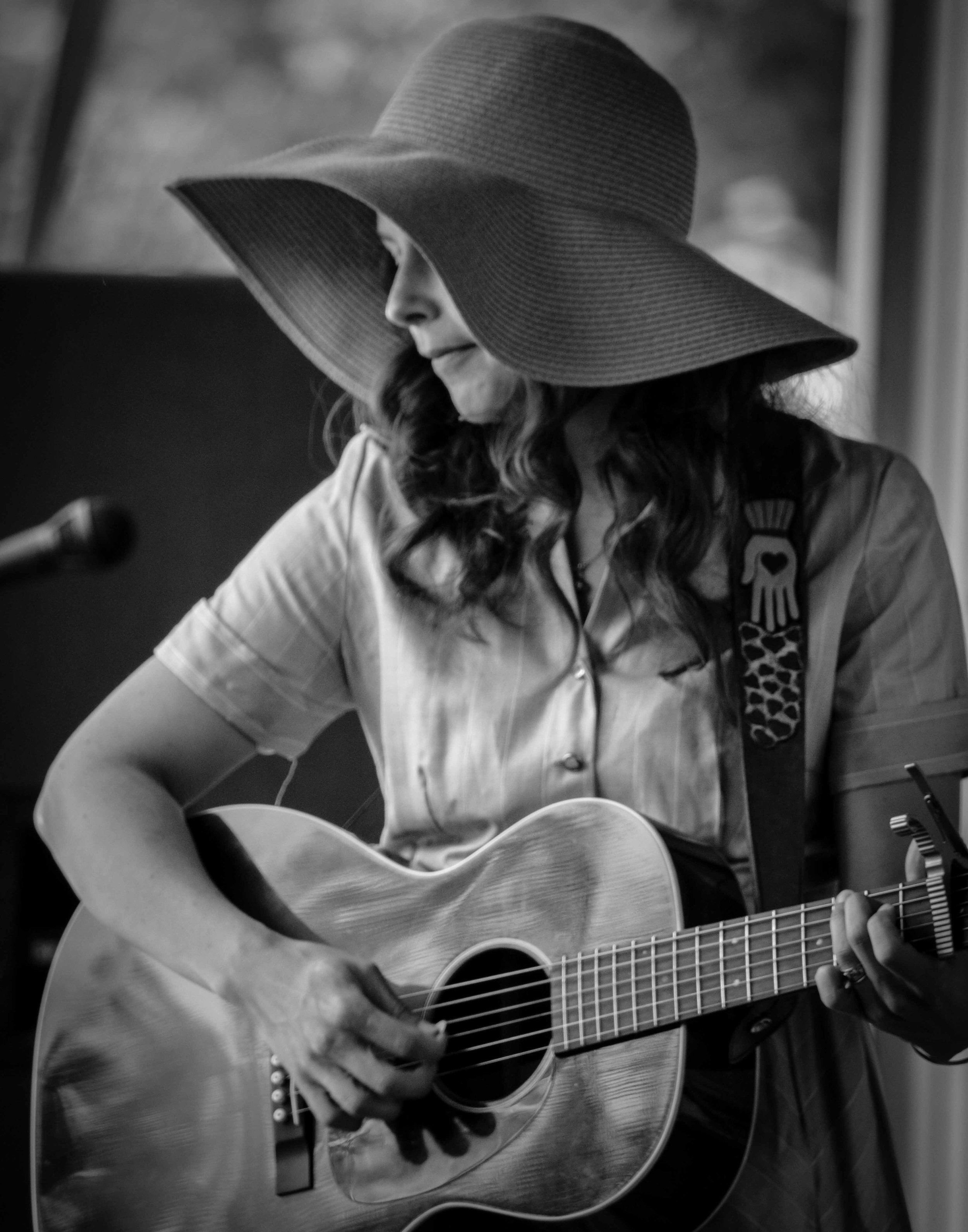  May Erlewine performing on stage at the Buttermilk Jamboree in Delton, Michigan 