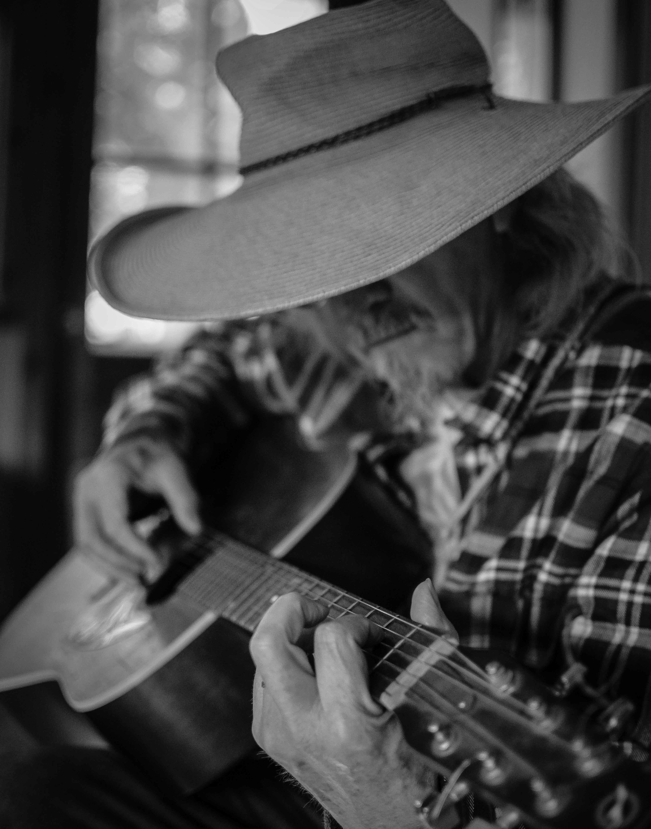  Peter Madcat Ruth plays guitar for me on the porch of the Circle Pines Center Co-op 