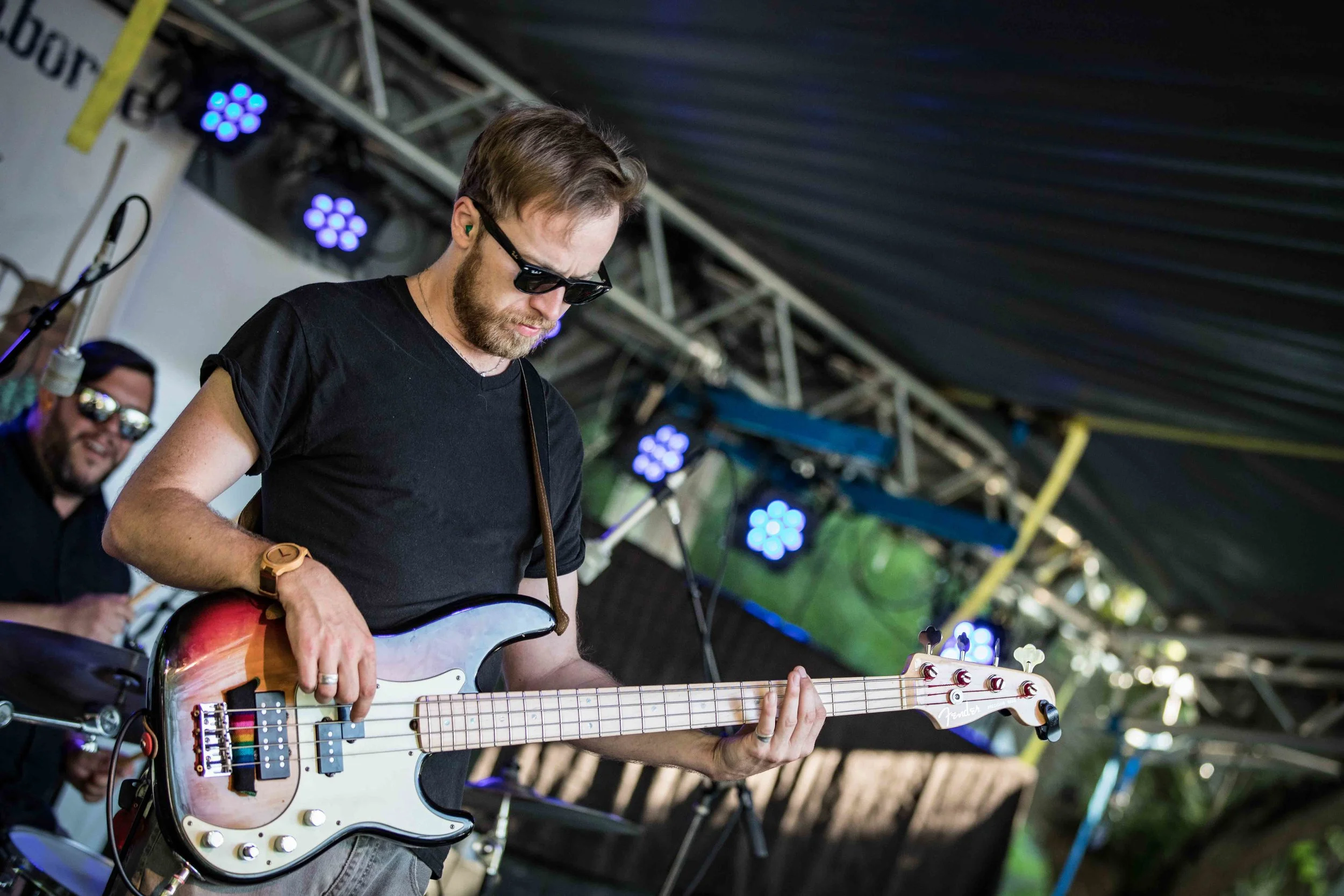 Bass guitarist during plays at the Buttermilk Jamboree Music Festival