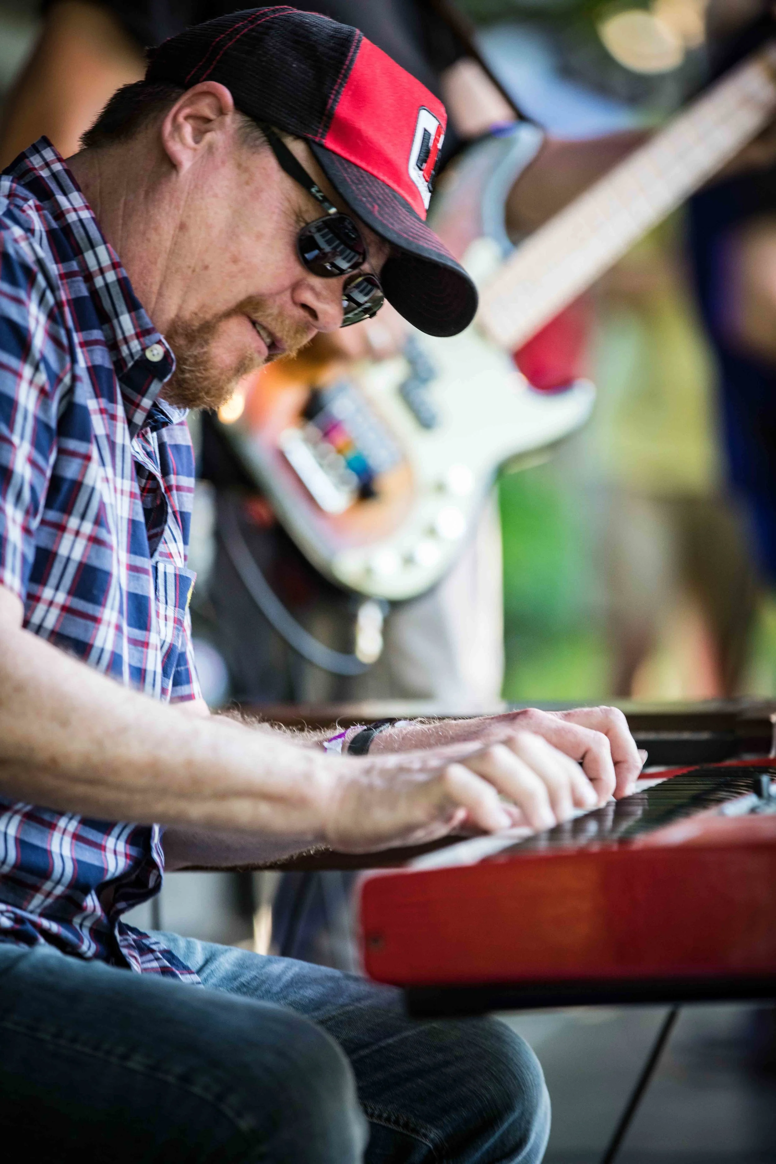 Keyboardist jamming during their set on the main stage