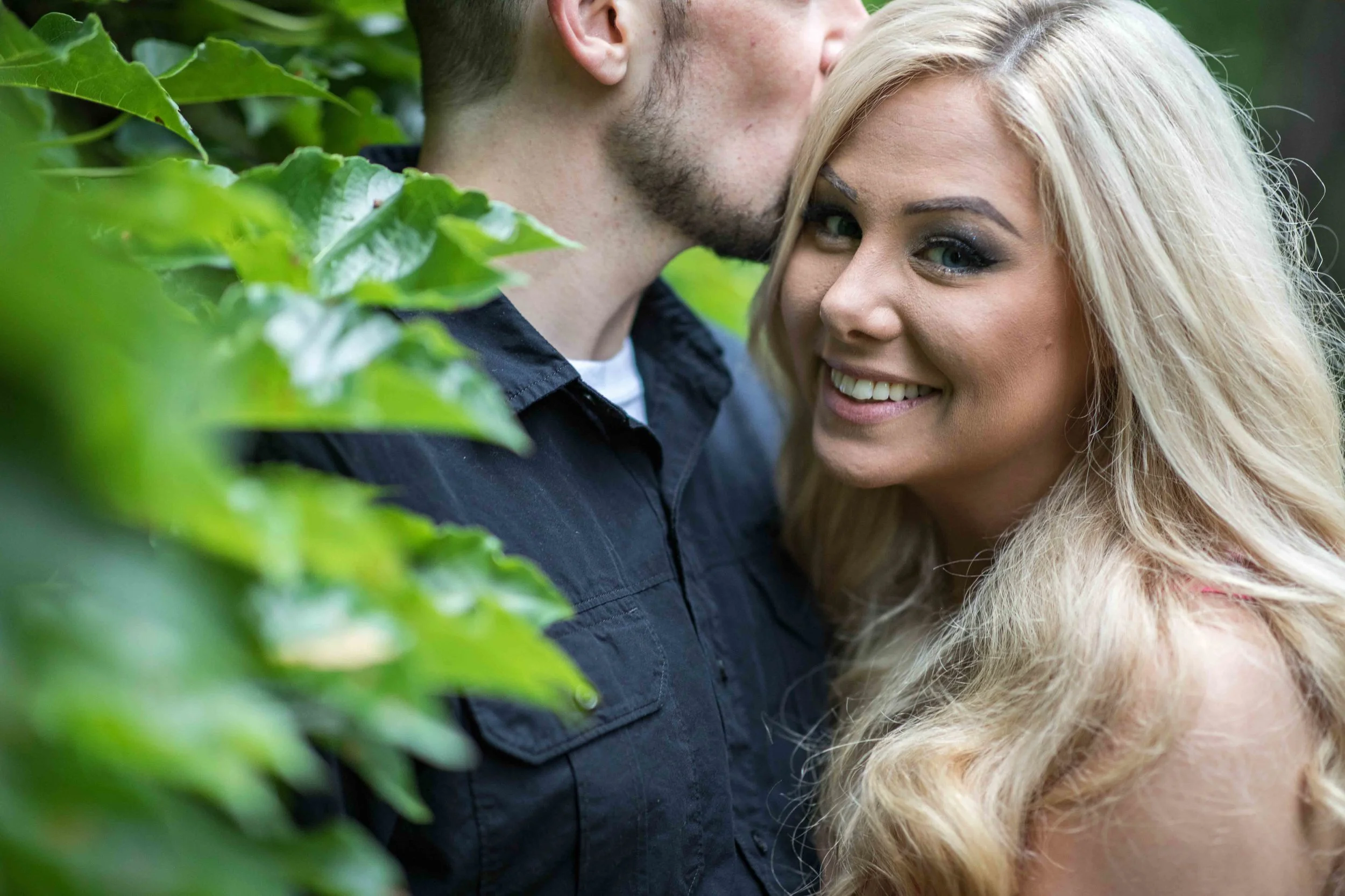 A hidden kiss in the ivy at Vandercook Hall in Kalamazoo Michigan
