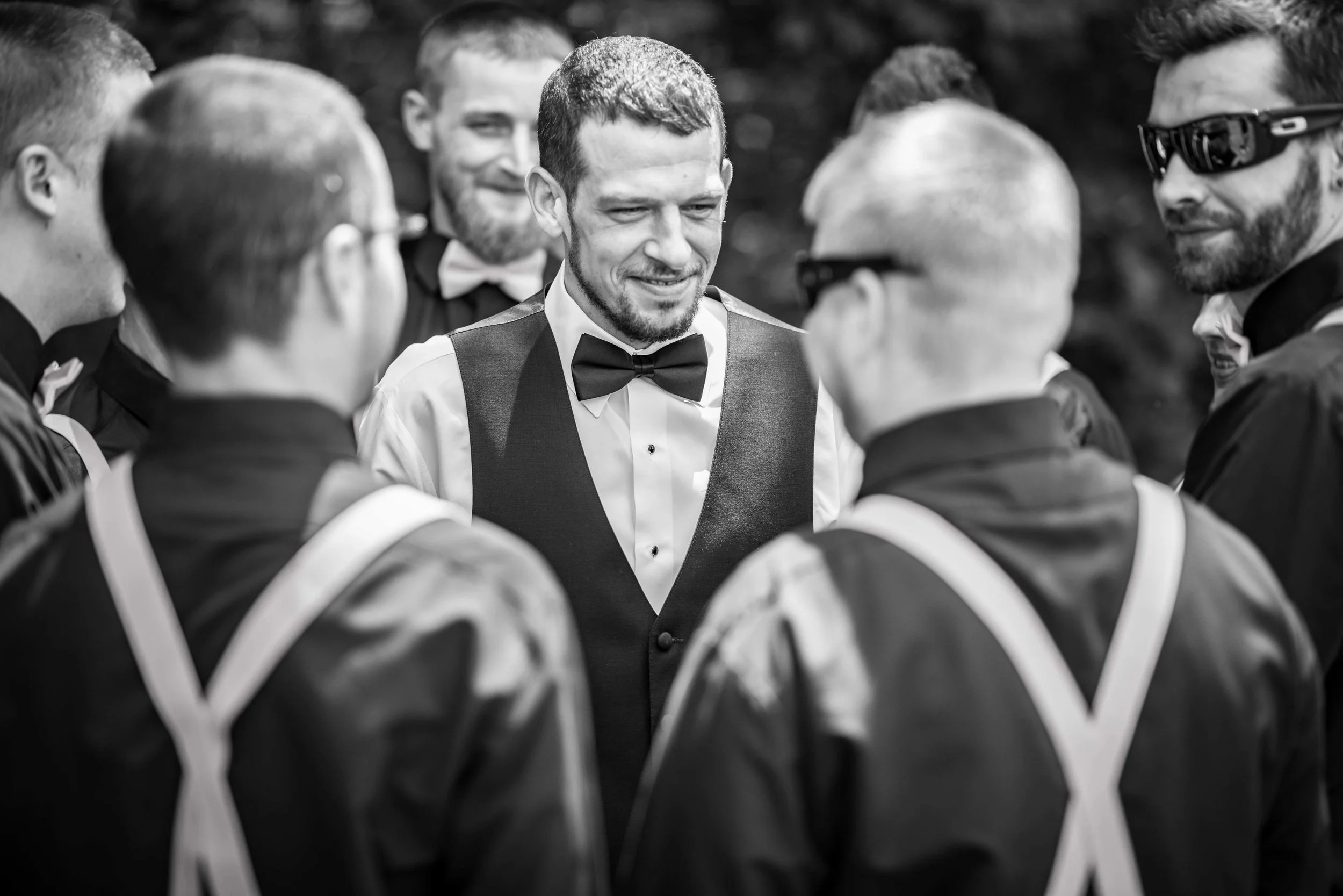 The Groom is surrounded by all his best friends