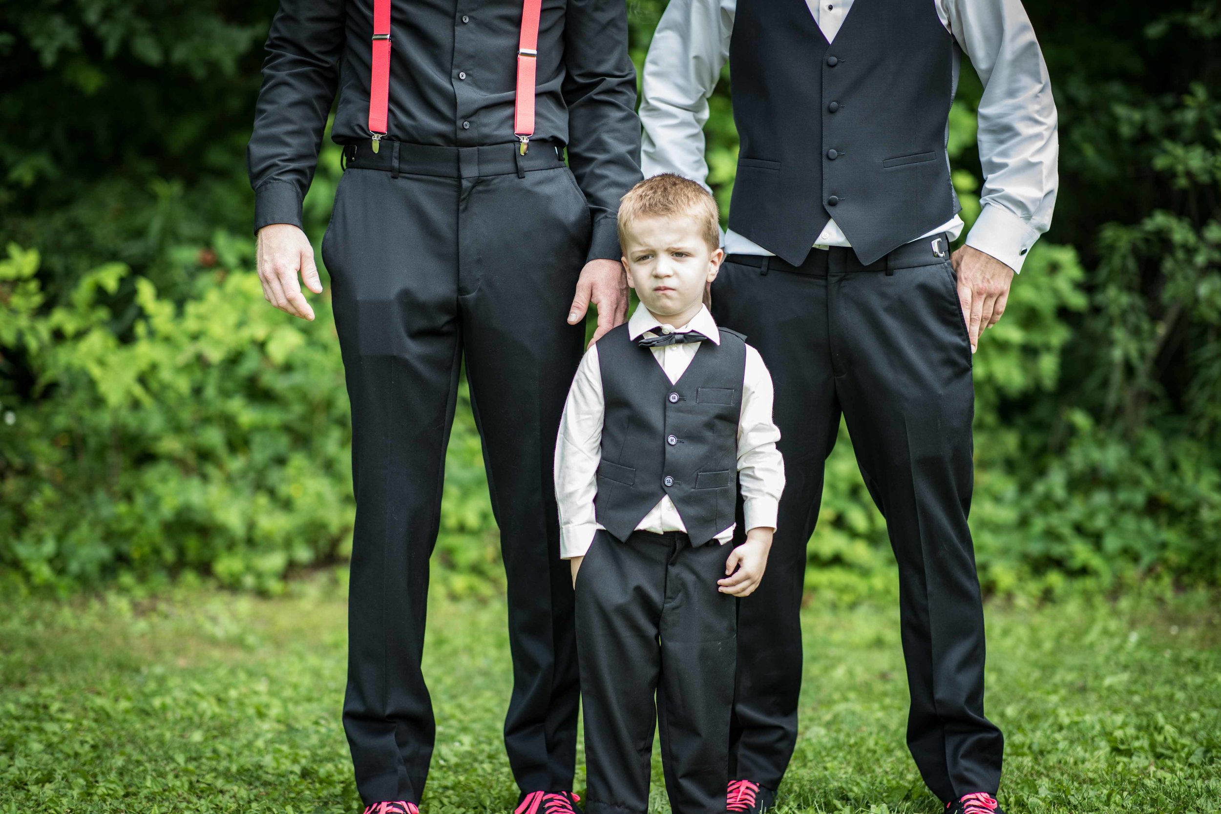  The shy ring bearer finally poses for a photo 