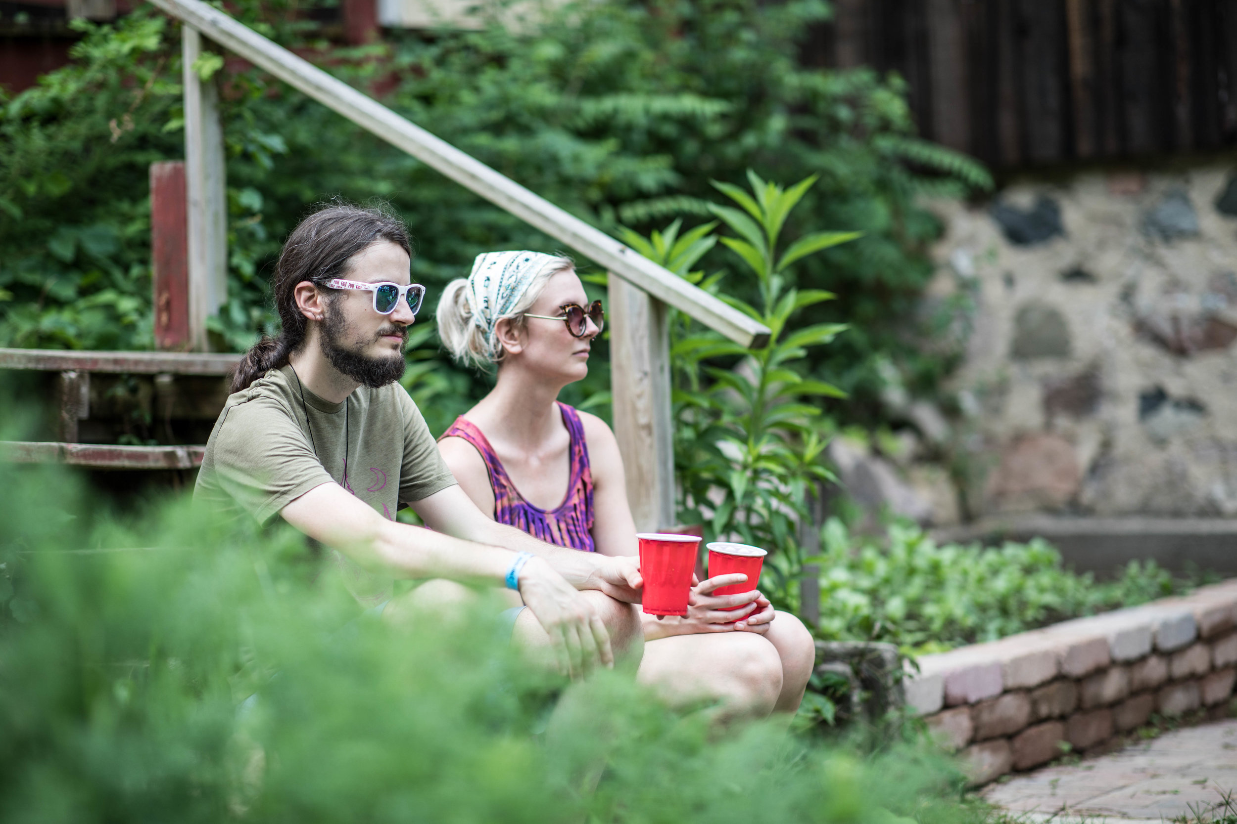  two festivals goers taking a break 