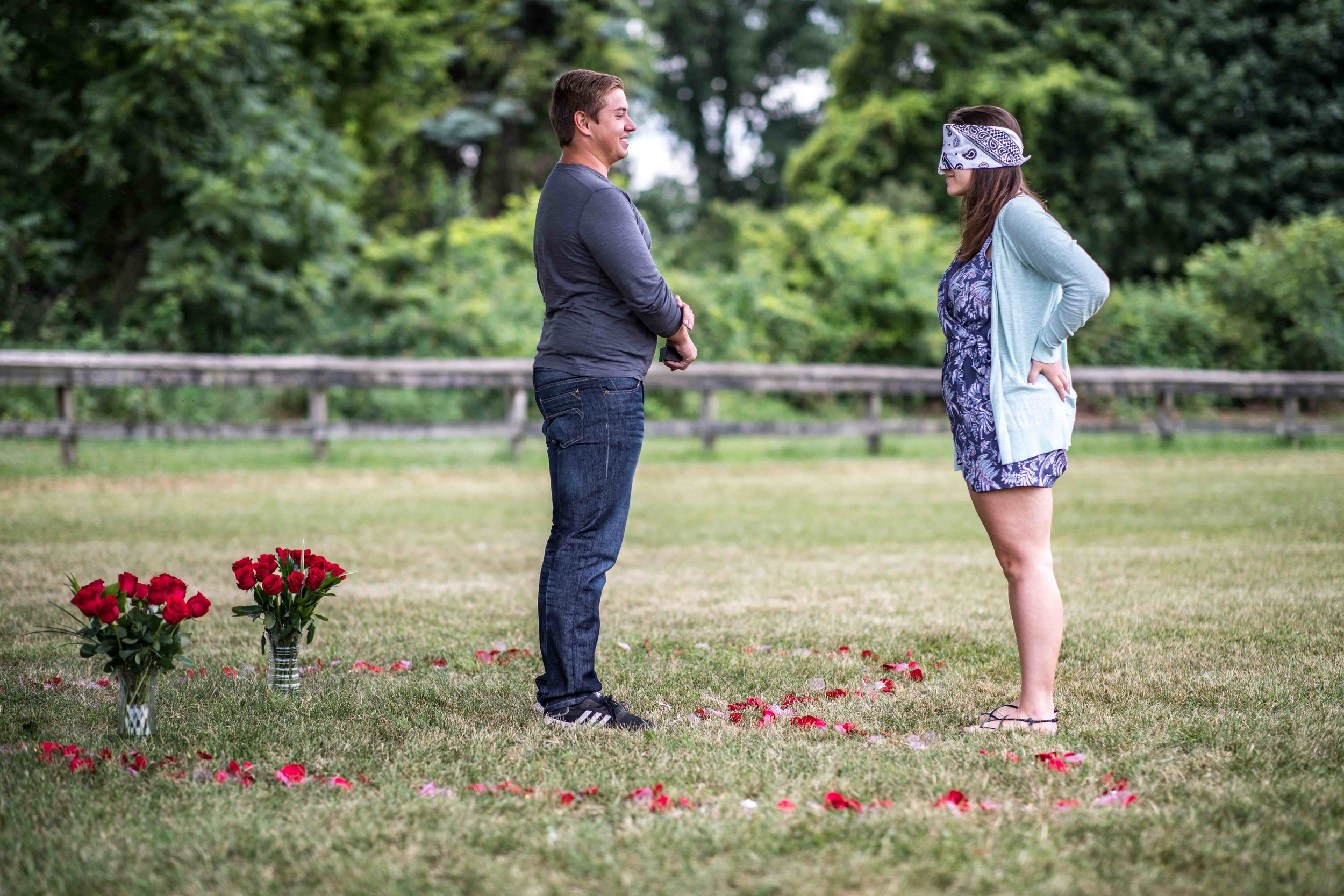  Boyfriend prepares to take a knee in front of his blindfolded girlfriend 