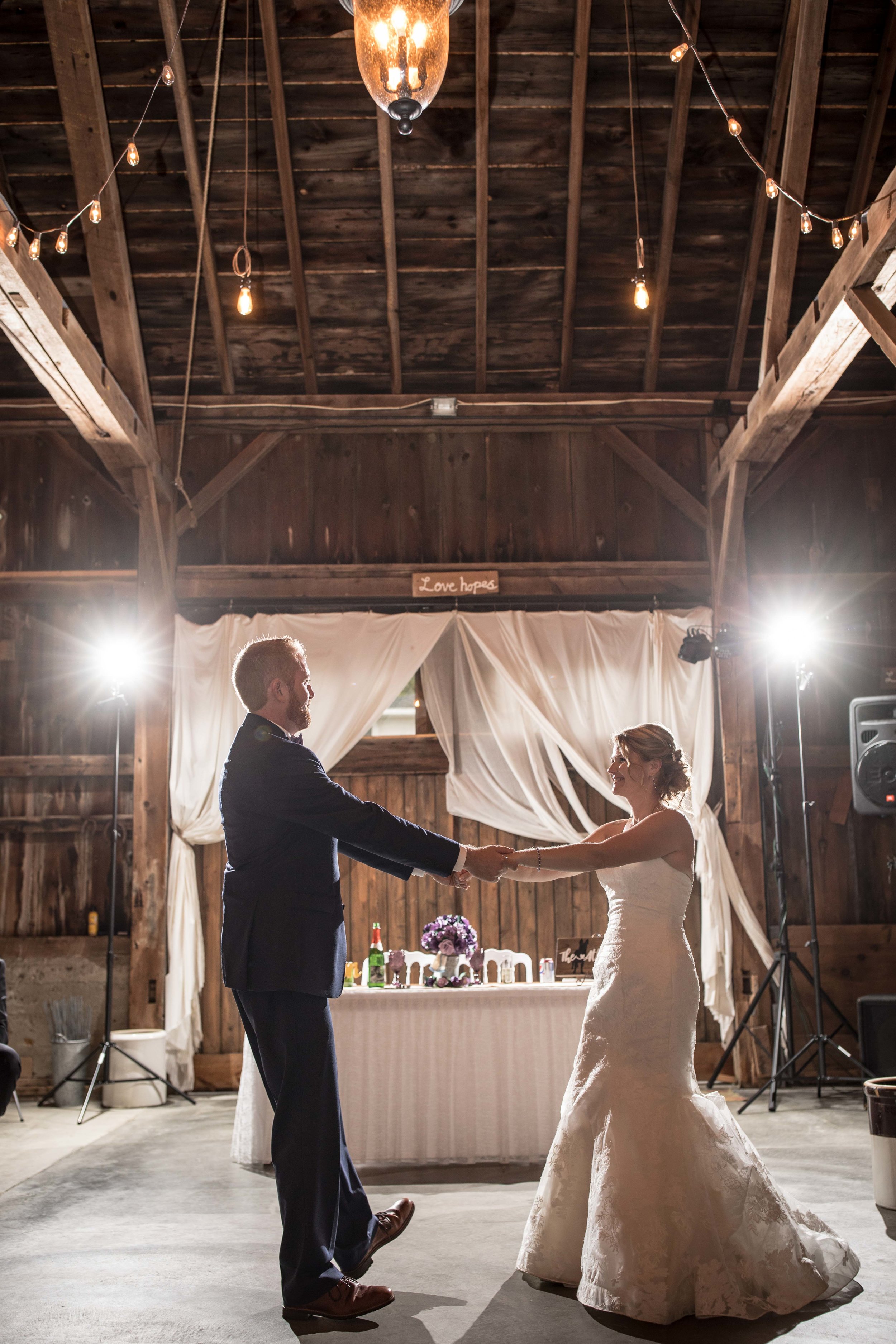  bride and groom share their first dance 