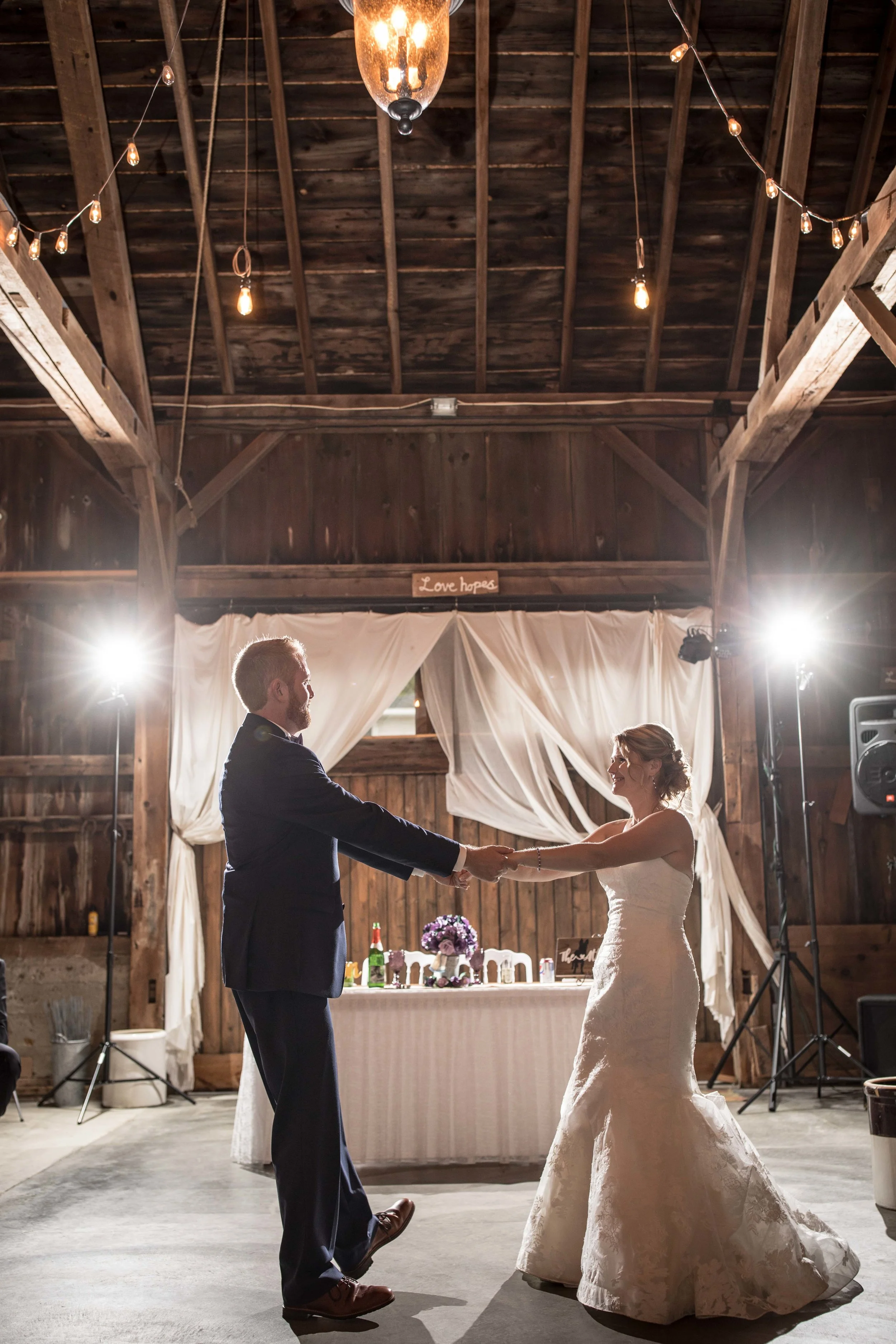 bride and groom share their first dance