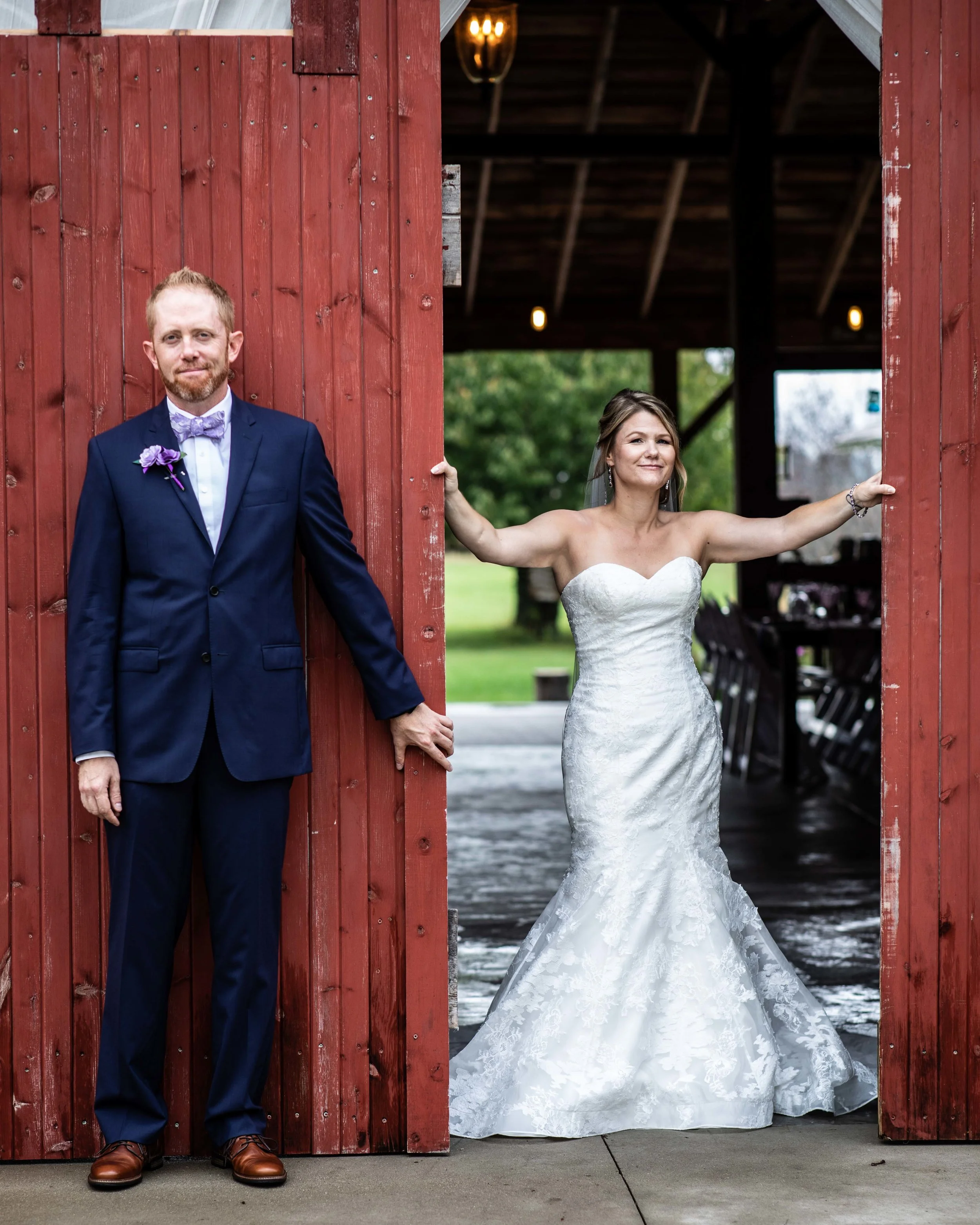 The Bride and Groom’s hidden first look with the bride in the barn and groom just outside
